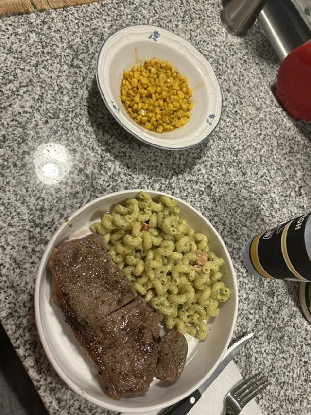 Steak W/ pesto Pasta and Cajun Corn