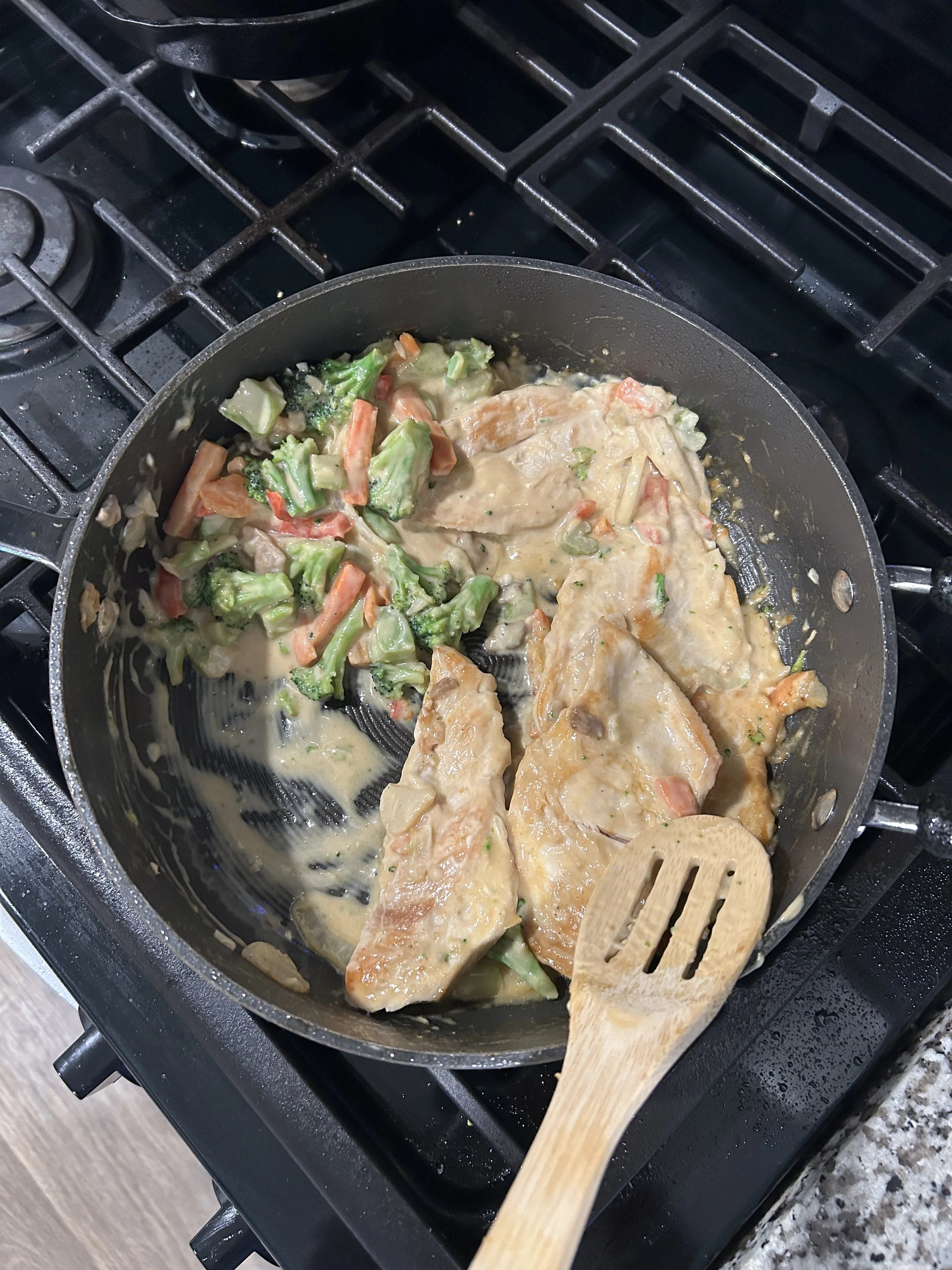 Creamy Garlic Chicken W/ veggies served on white rice