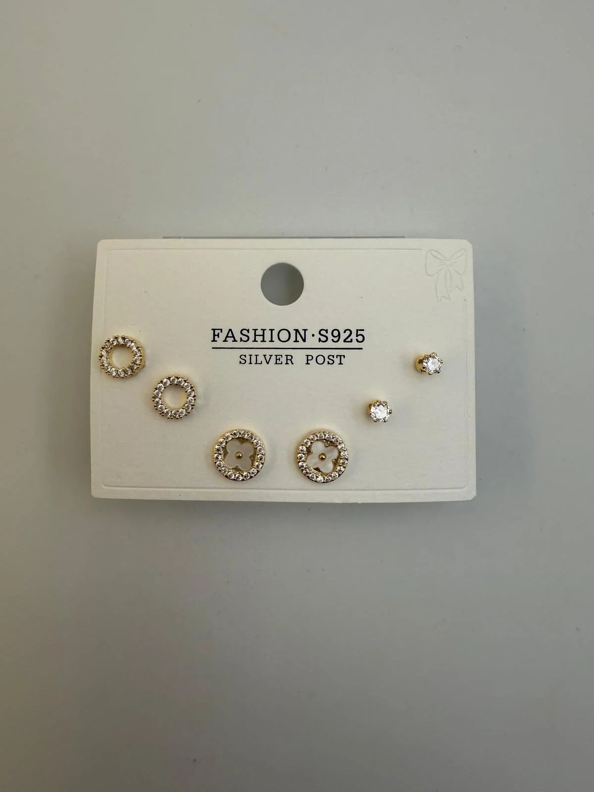 Set of six gold and silver earrings with rhinestones displayed on a white card labeled 'FASHION S925 SILVER POST'.