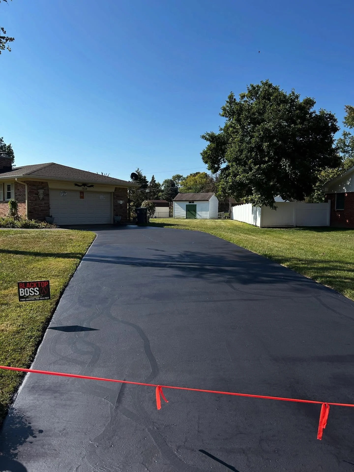 Blacktop Boss gave this driveway a fresh sealcoat and filled all the cracks in Indianapolis, Indiana. 