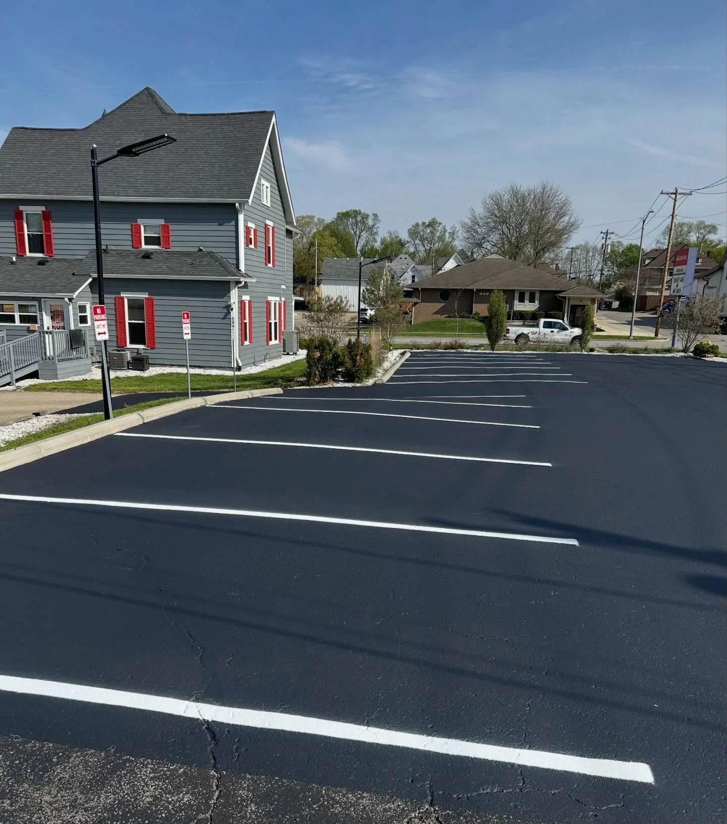 This State Farm Insurance Parking Lot got the full package from Blacktop Boss of sealcoat, crackfill, and parking lot striping. 