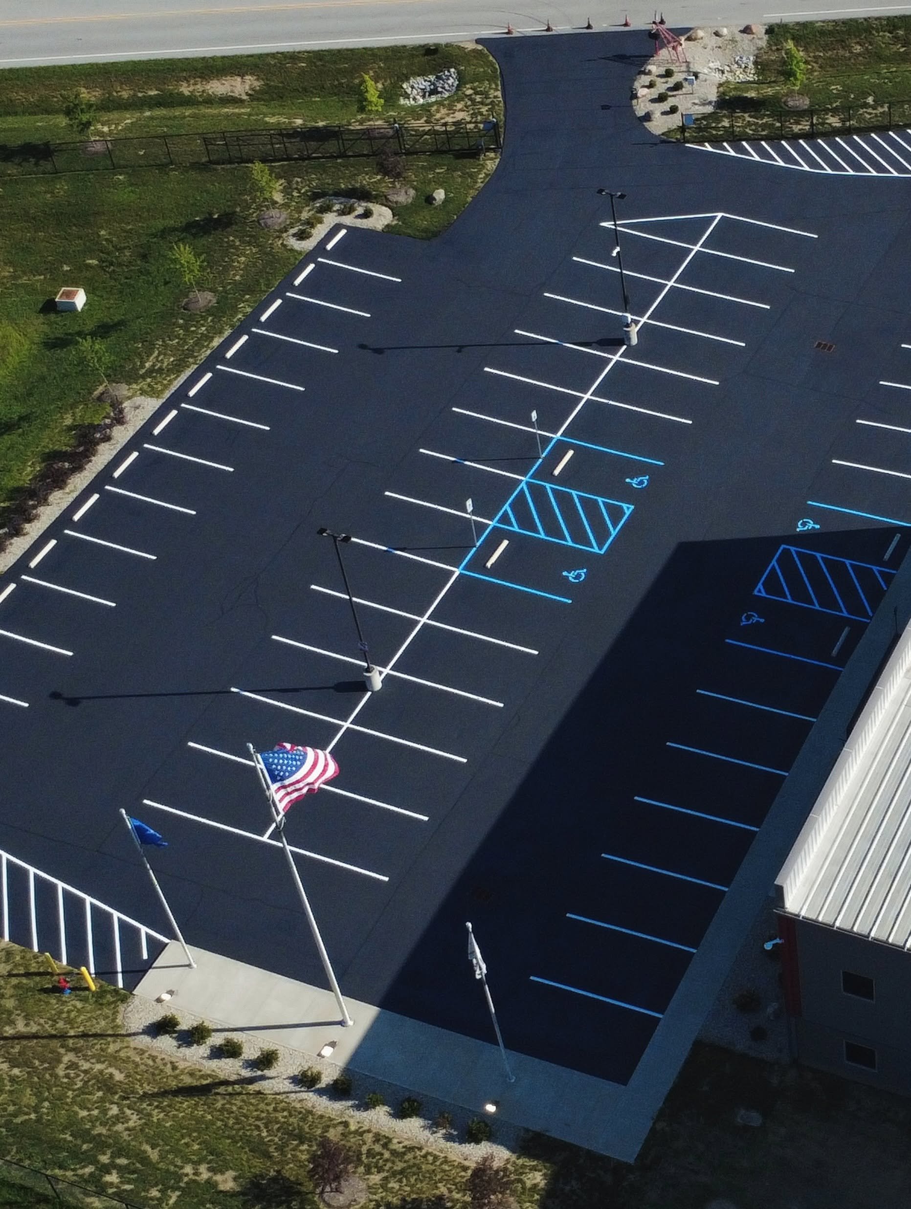 All Crane, a commercial parking lot in Fairland, Indiana got their parking lot sealcoat, crackfilled, and parking stalls restriped by Blacktop Boss. 