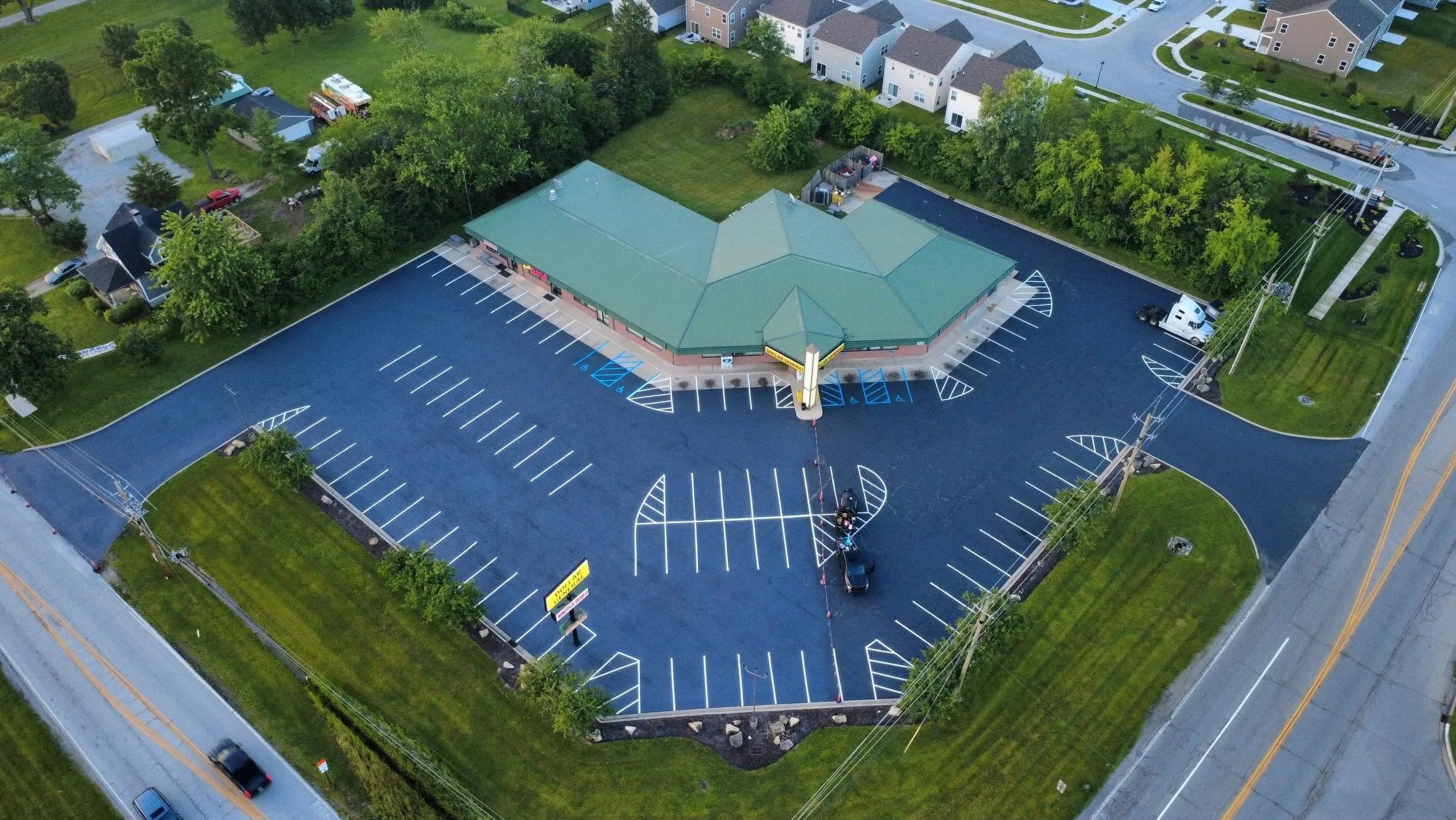 A Dollar General commercial parking lot in Indianapolis, Indiana had some asphalt maintenance work completed by Blacktop Boss. They received the full package of sealcoat, crackfill / crackseal and a restripe.