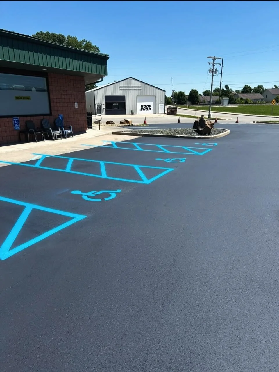 Dollar General in Brownsburg Indiana with sealcoat, crackfilling, and parking lot striping completed by Blacktop Boss. 