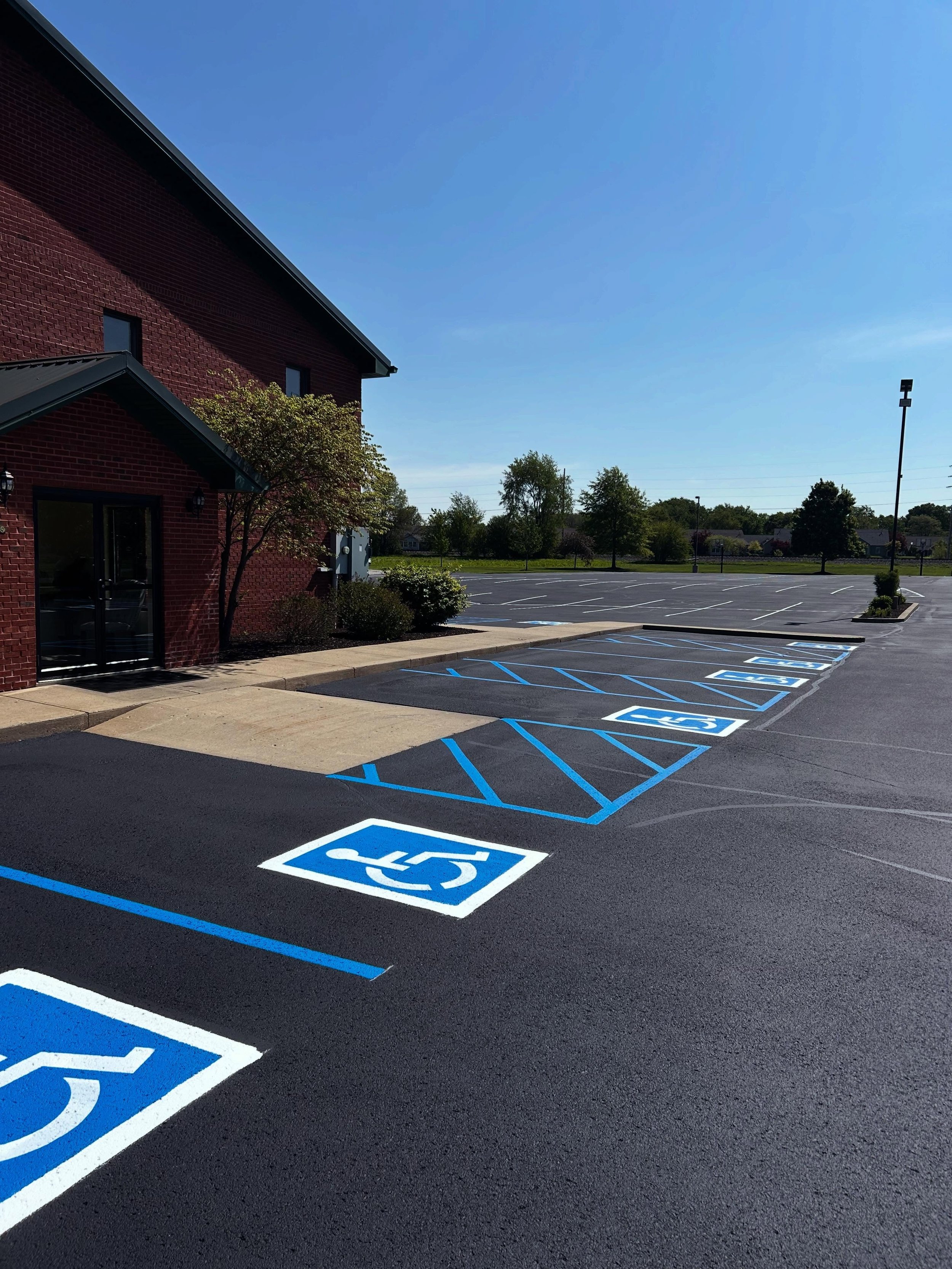 This church in Lebanon, Indiana received the full pack by Blacktop Boss - Sealcoat, Crackfill, & Parking lot striping including ADA. 