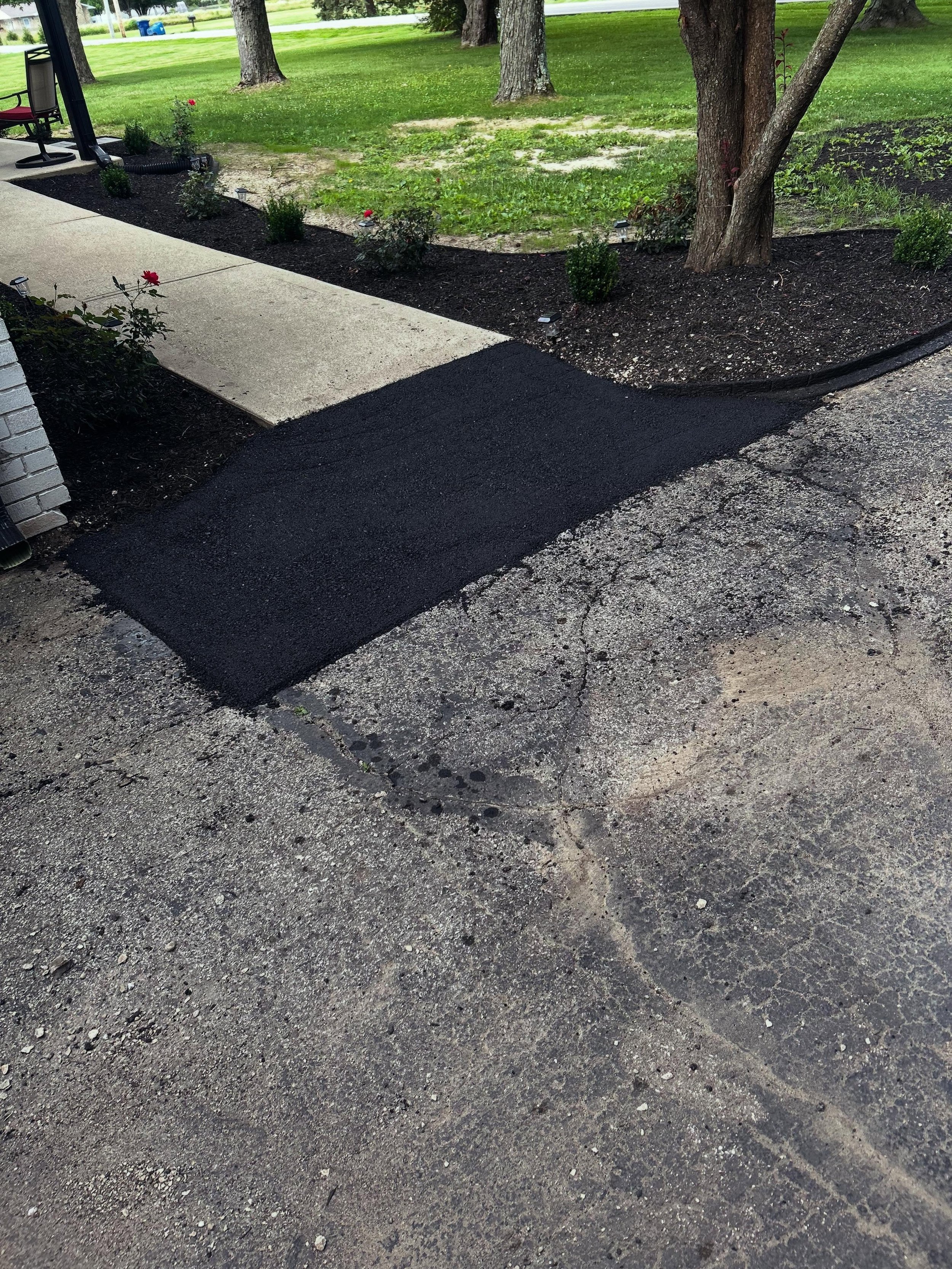 Asphalt repair completed by Blacktop Boss in Whiteland, Indiana. 