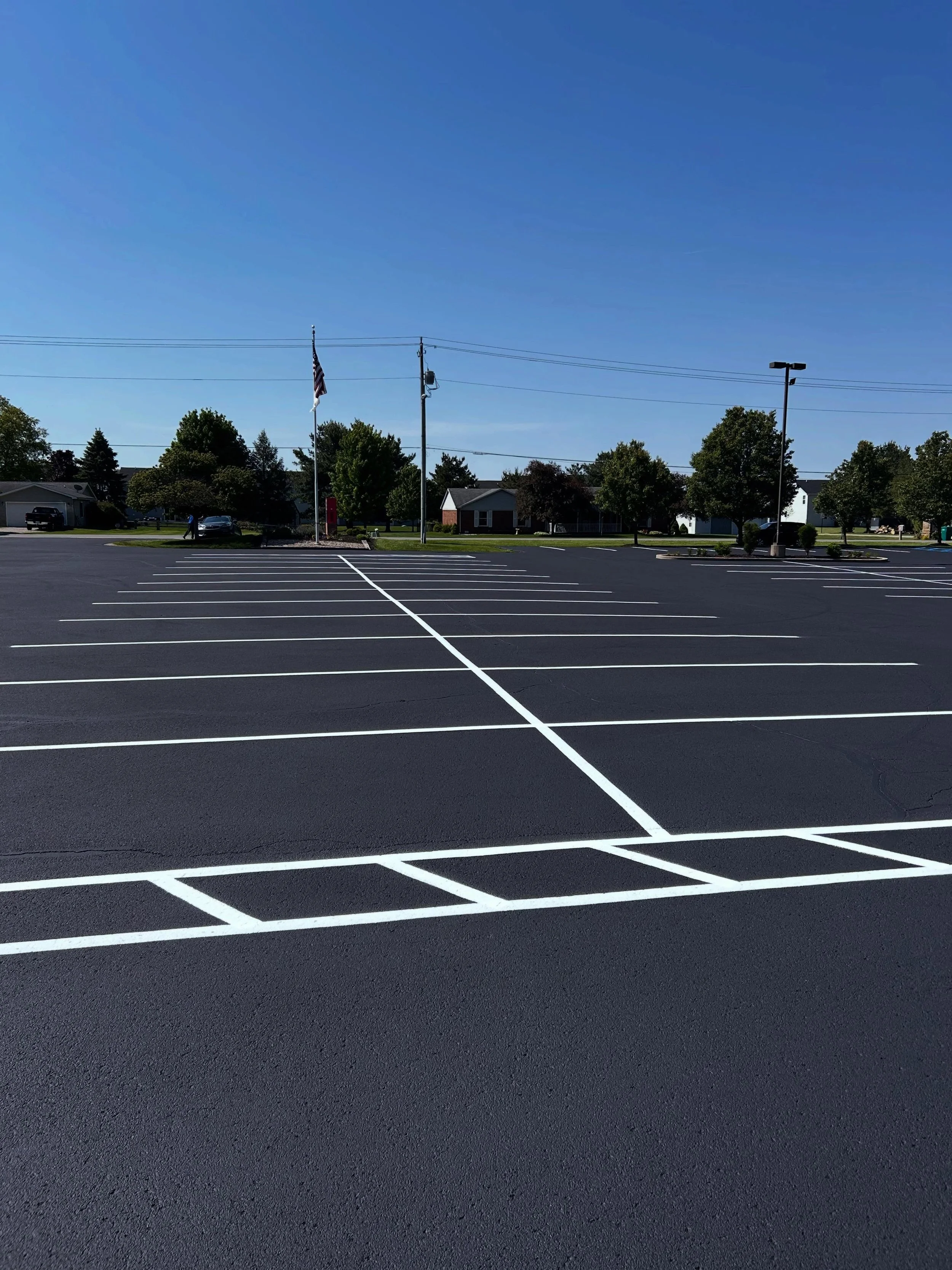 This church in Lebanon, Indiana received the full pack by Blacktop Boss - Sealcoat, Crackfill, & Parking lot striping. 