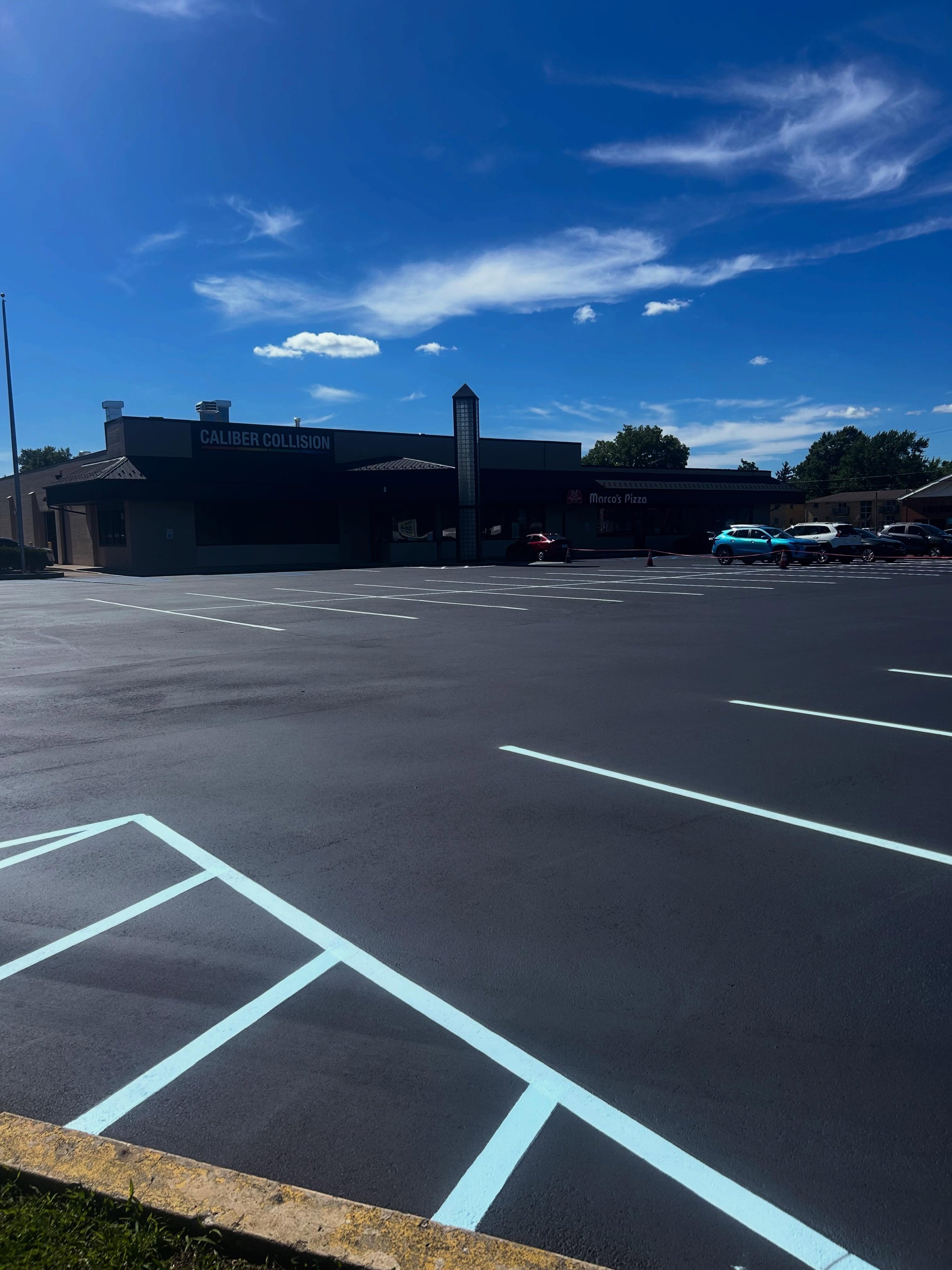 A commercial parking lot in North Vernon, Indiana had some asphalt maintenance work completed by Blacktop Boss. They received the full package of sealcoat, crackfill / crackseal and a restripe. 