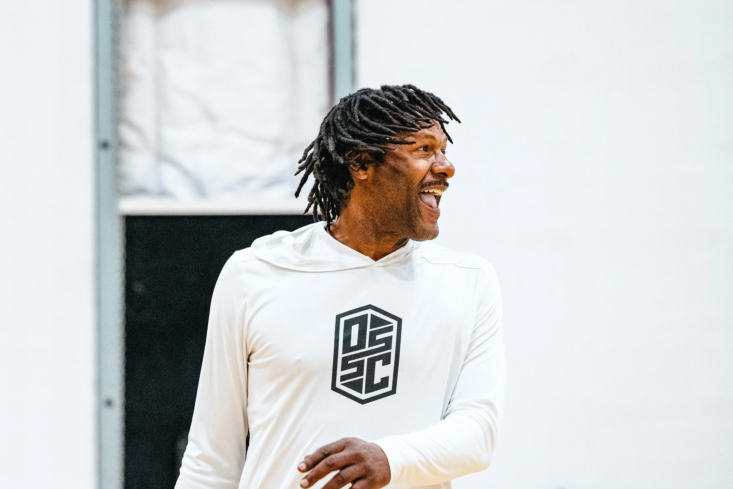 Summer camp coach leading structured youth sports activities in Dripping Springs, TX