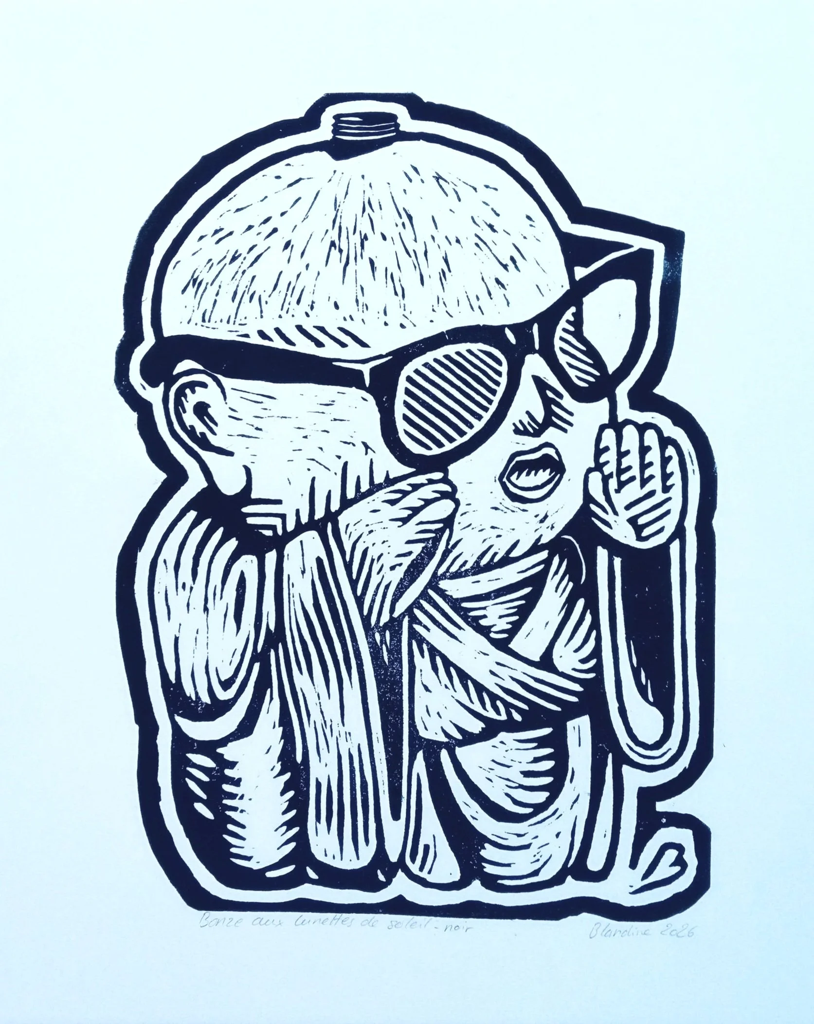 bonze aux lunettes de soleil - noir