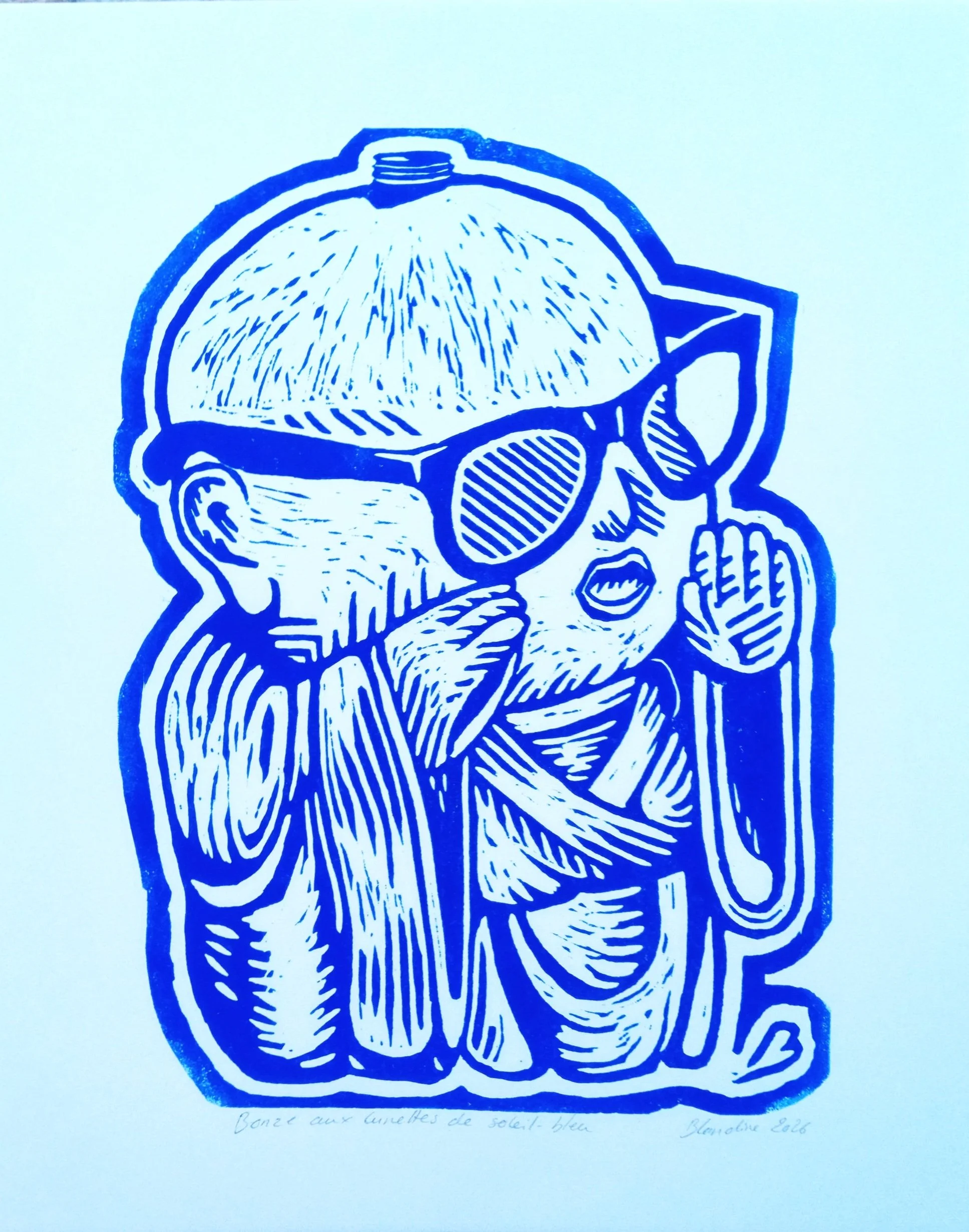 bonze aux lunettes de soleil - bleu