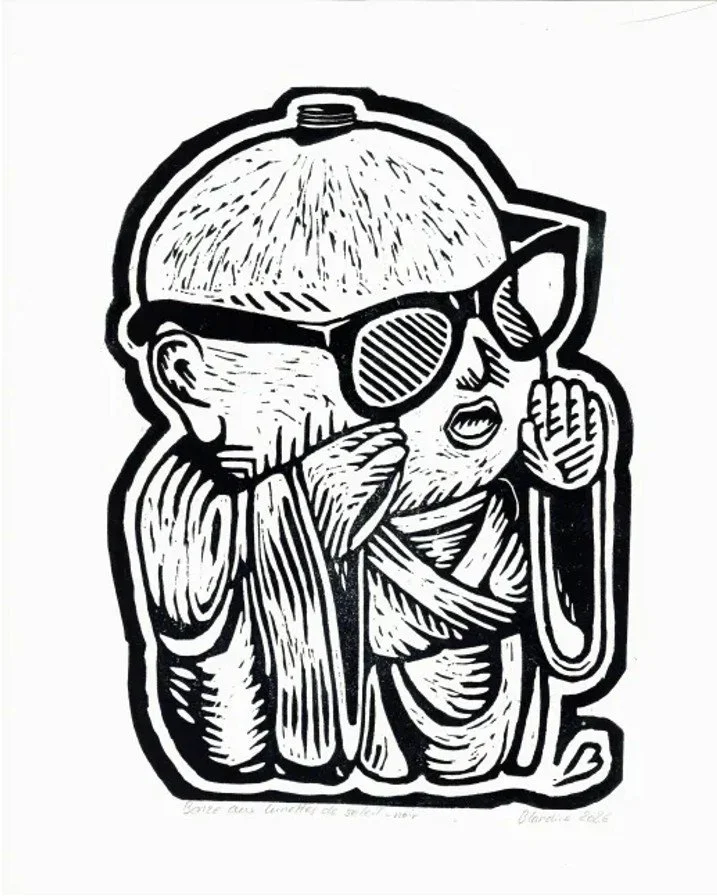 bonze aux lunettes de soleil - noir