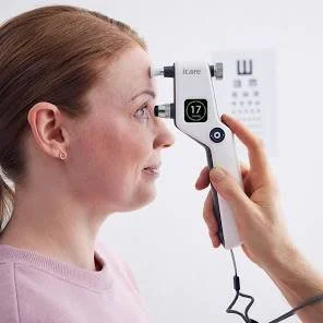 Optometrist measuring ocular pressure as part of glaucoma monitoring in Santa Monica