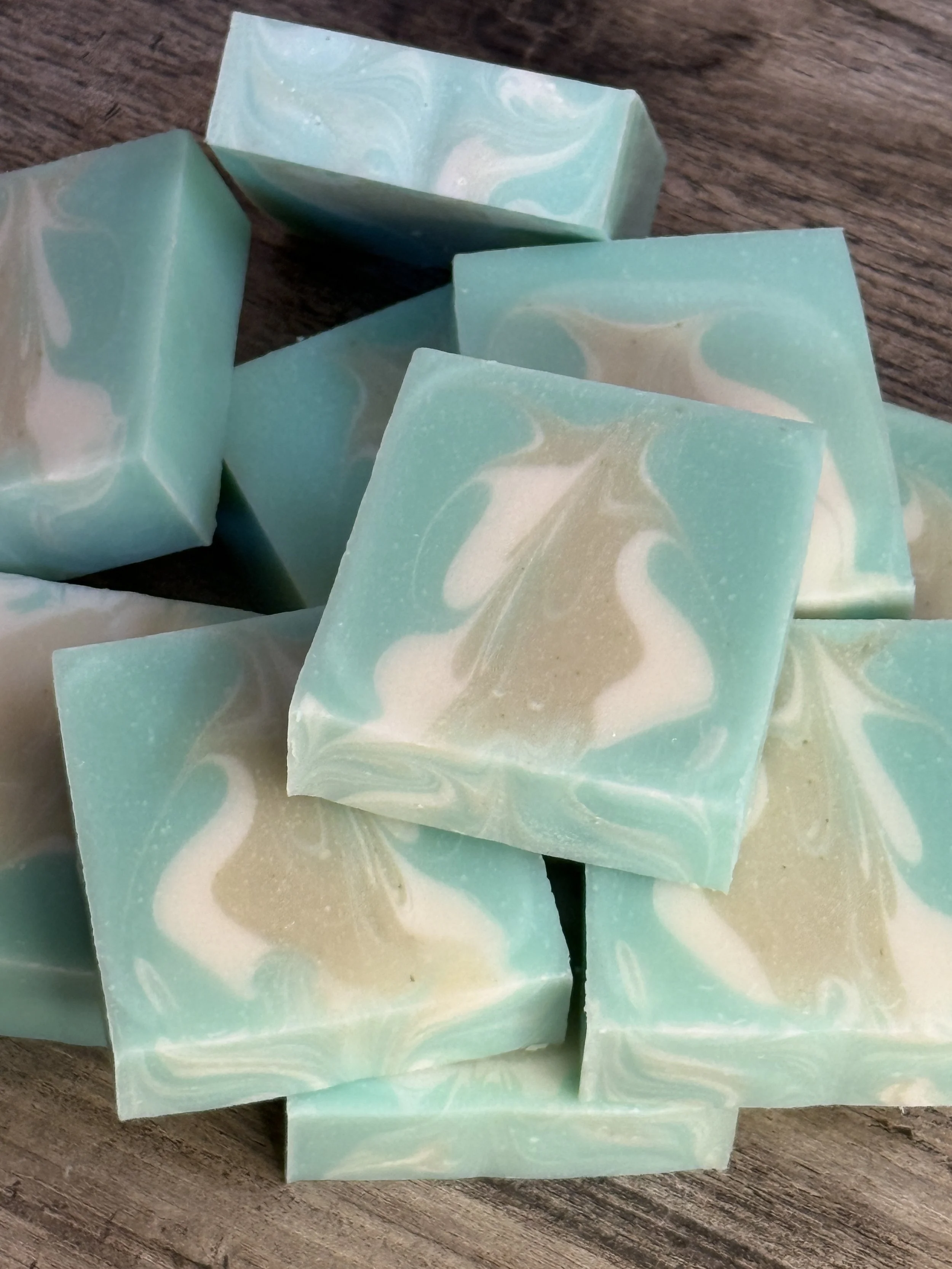 Cucumber mint tallow soap bar detail showing handmade swirl texture