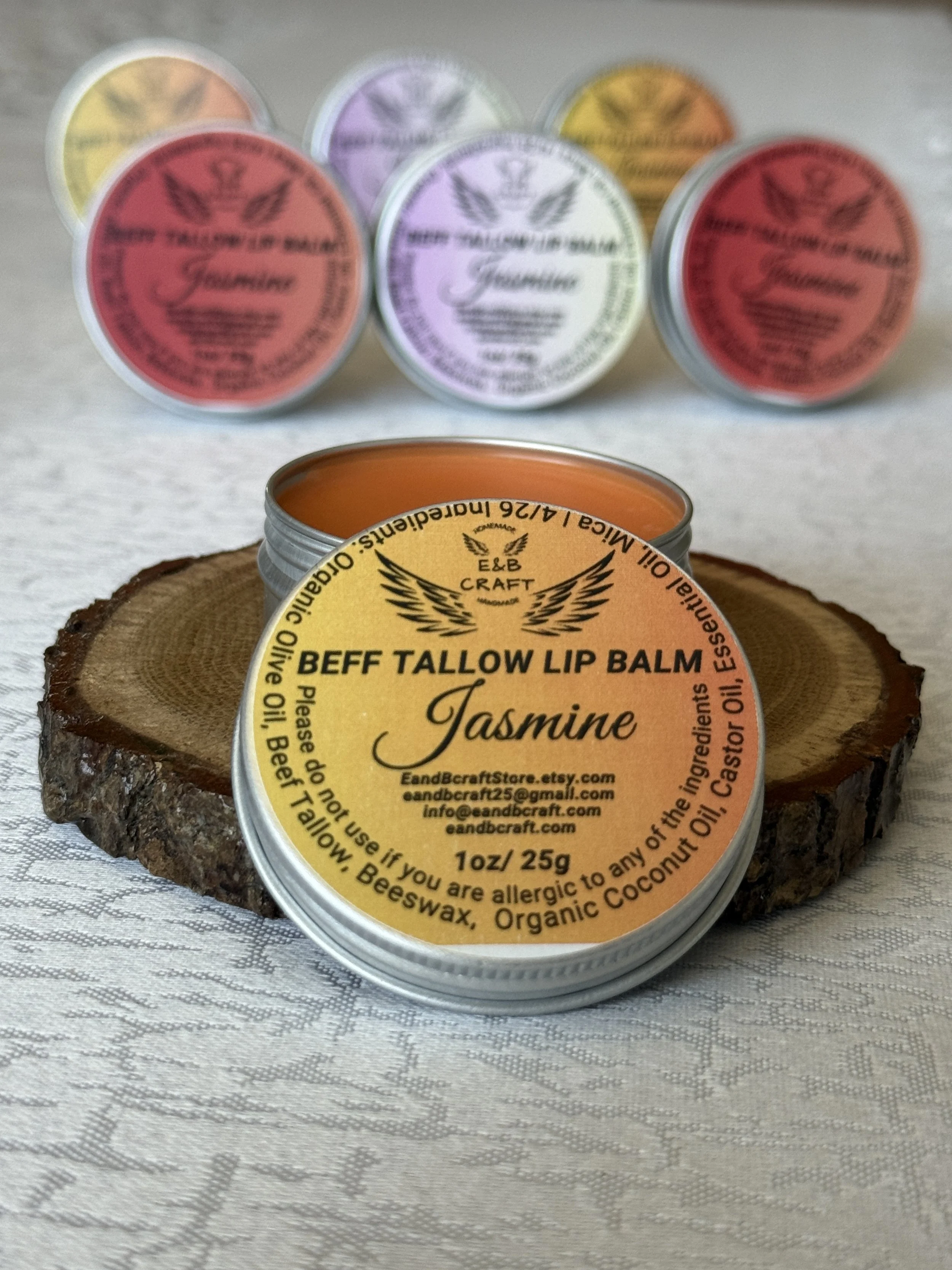 Orange tinted beef tallow lip balm in tin smooth application natural hydration