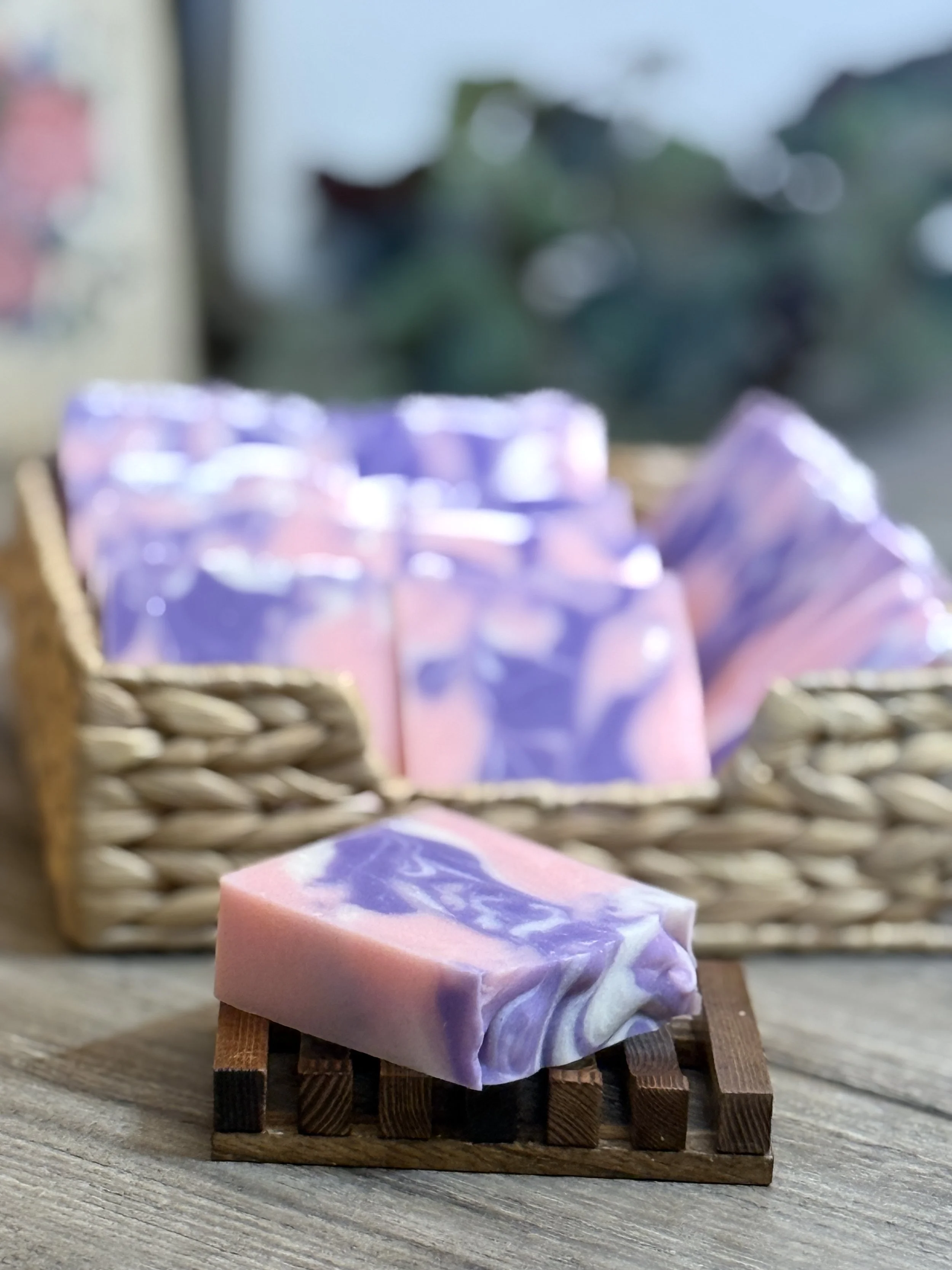 pink and purple soaps in the basket