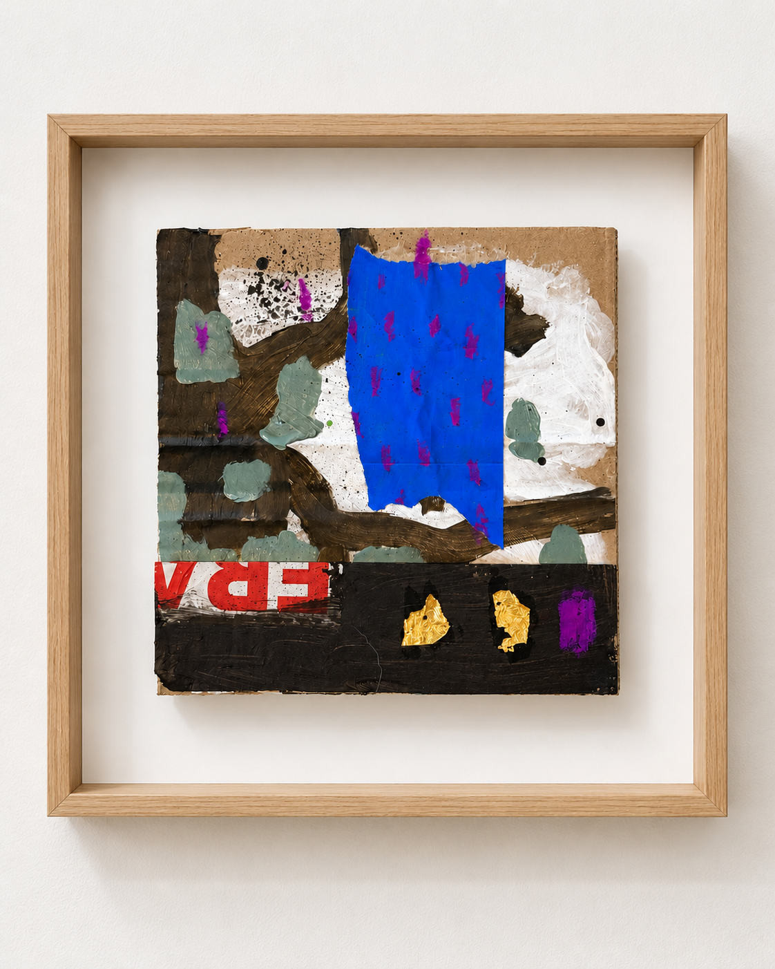 Straight-on abstract collage in oak frame-1.png