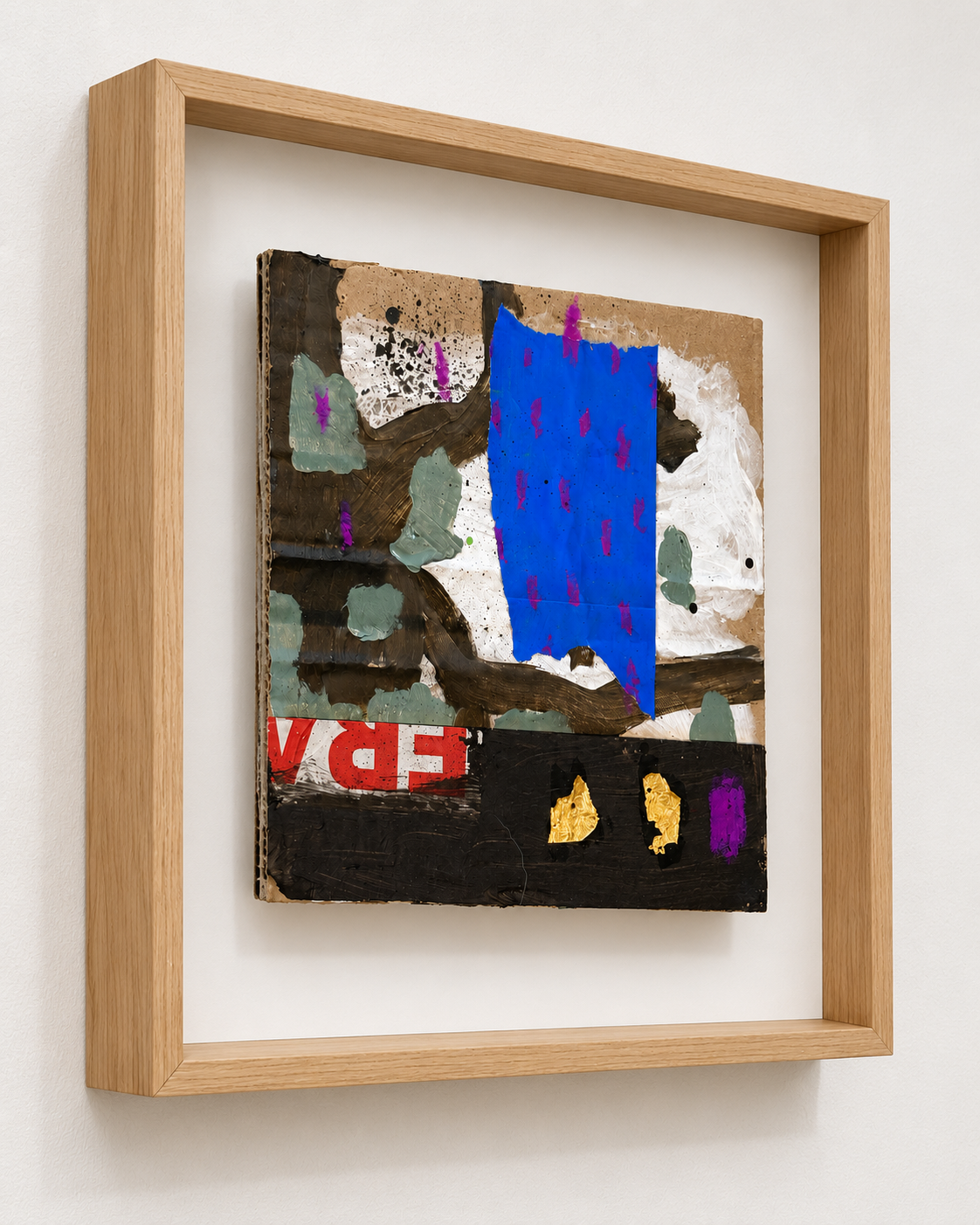 Left-side view of framed abstract collage.png