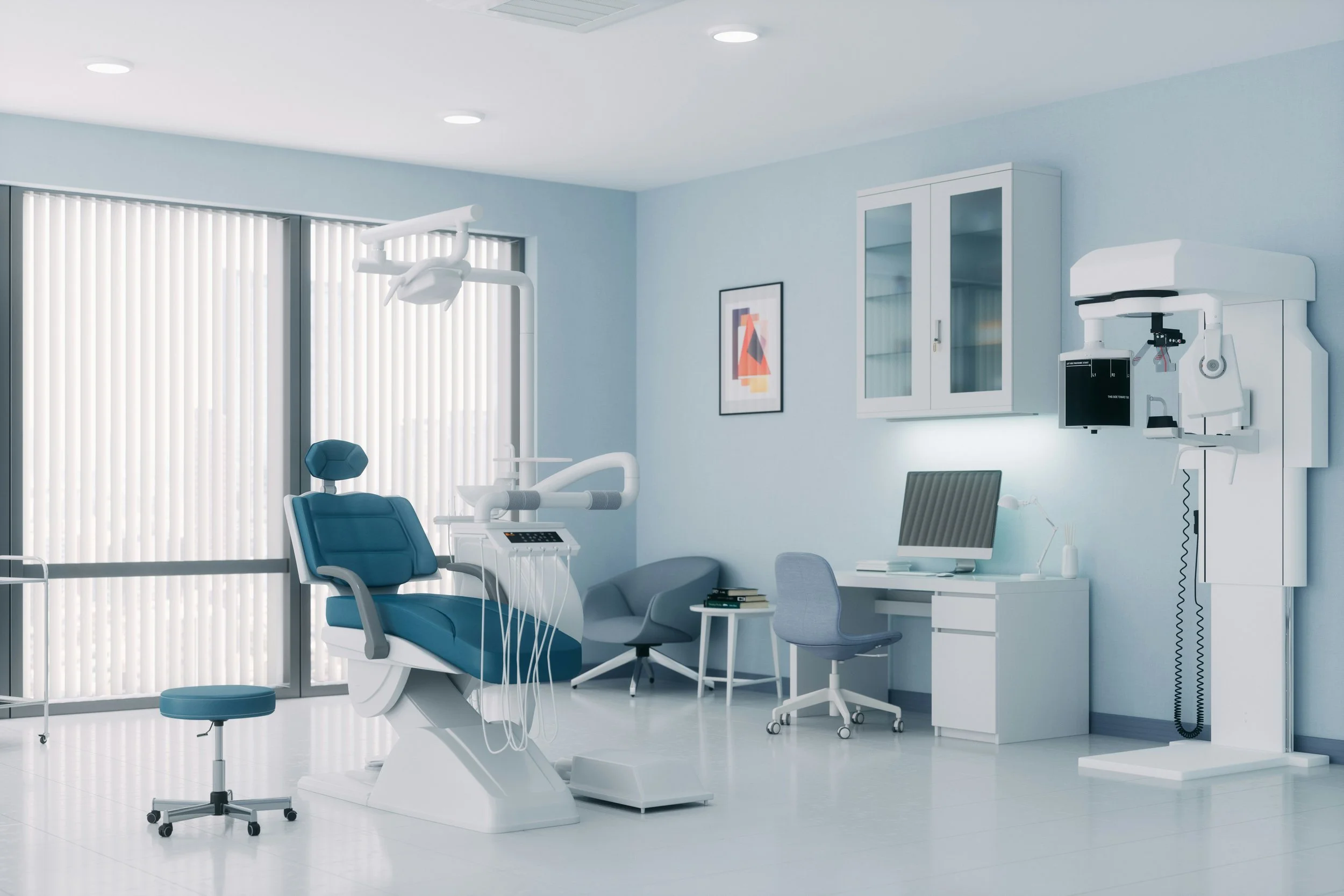 Empty dental examination room with dental chair, computer, cabinet, and dental equipment in a bright, modern clinic.