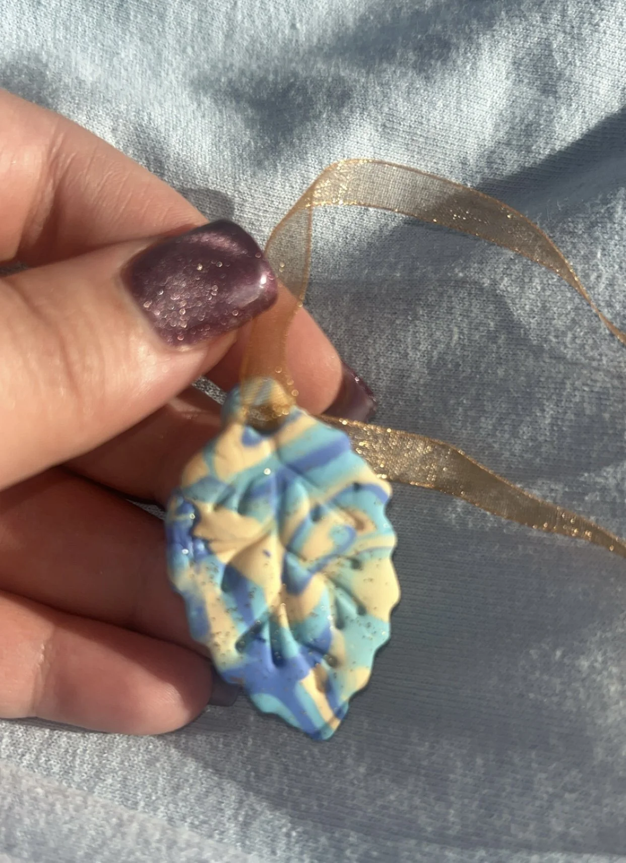 Handcrafted clay car air freshener