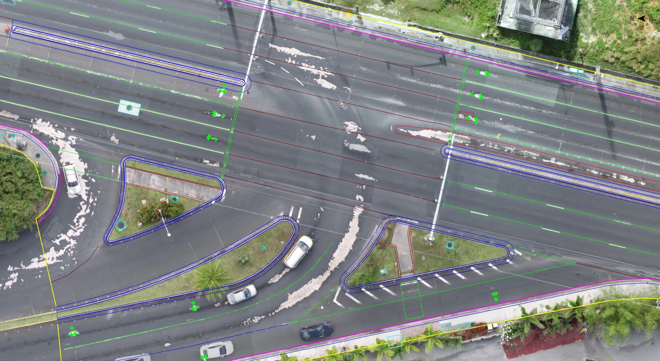 Aerial view of a multi-lane roadway intersection with marked destress zones, and various planimetric CAD linework.