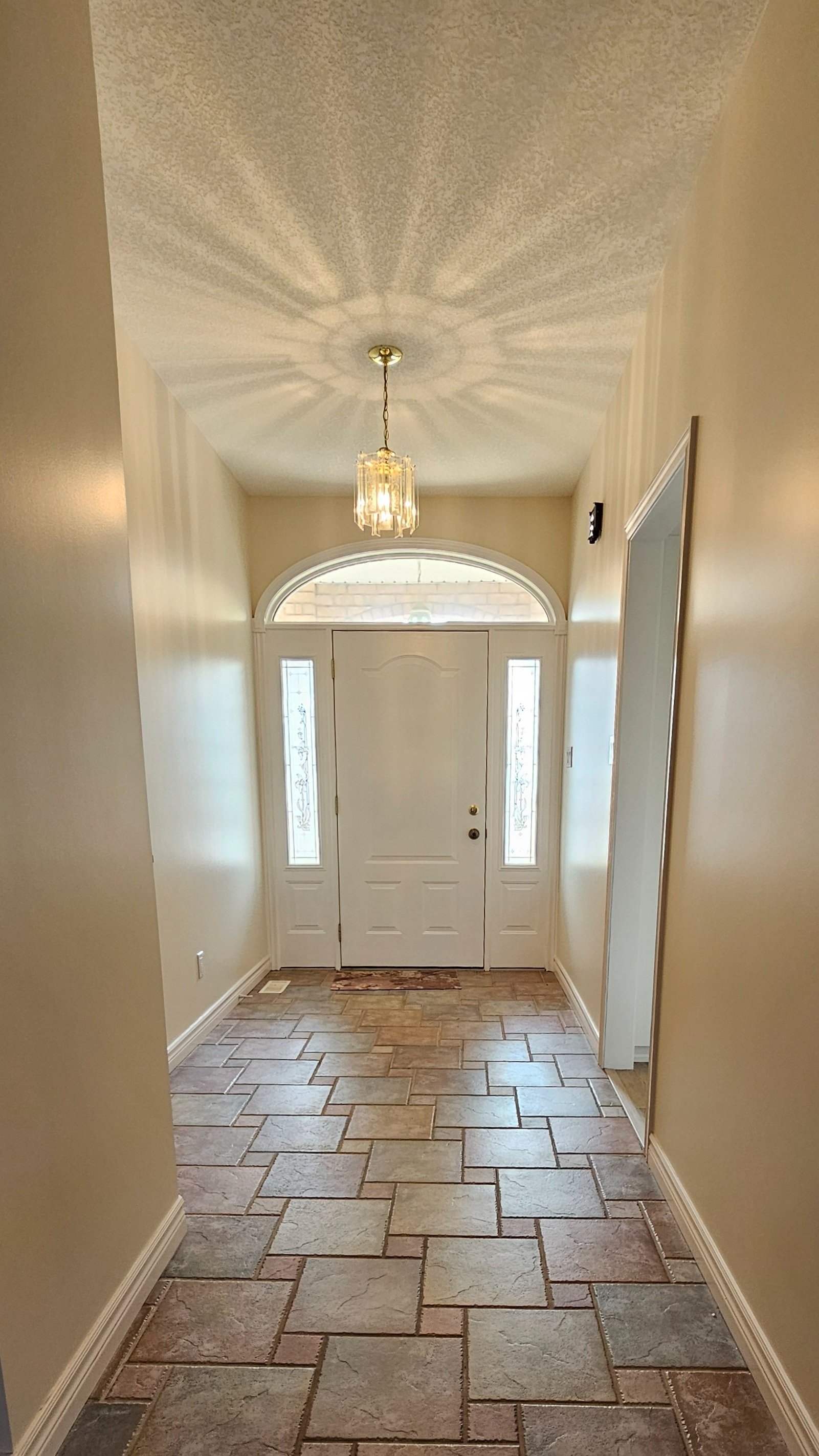 Main floor interior repaint by Major Painting in Doon South, Kitchener — hallway after colour change