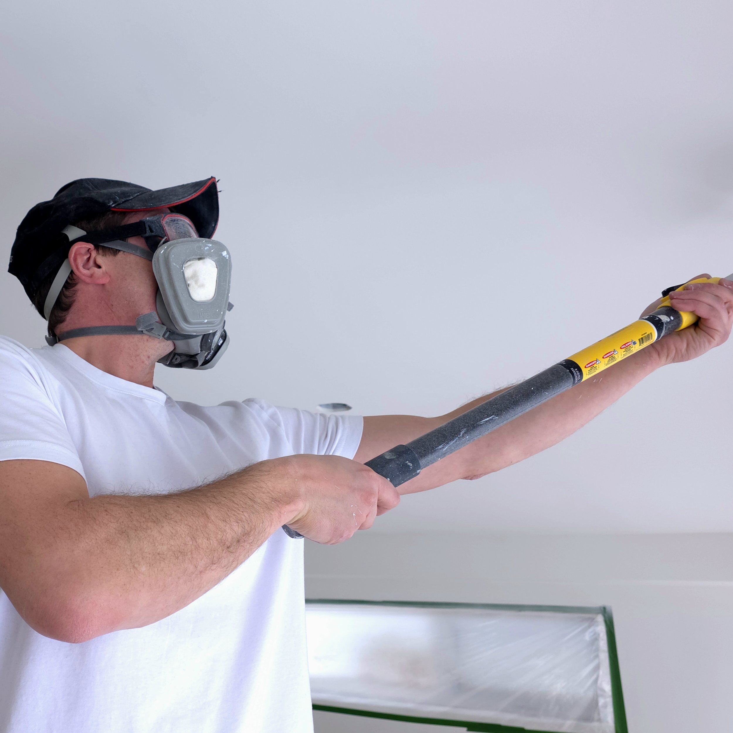 Popcorn ceiling texture removal and scraping service in Kitchener, Waterloo and Guelph for modern flat ceiling refinishing