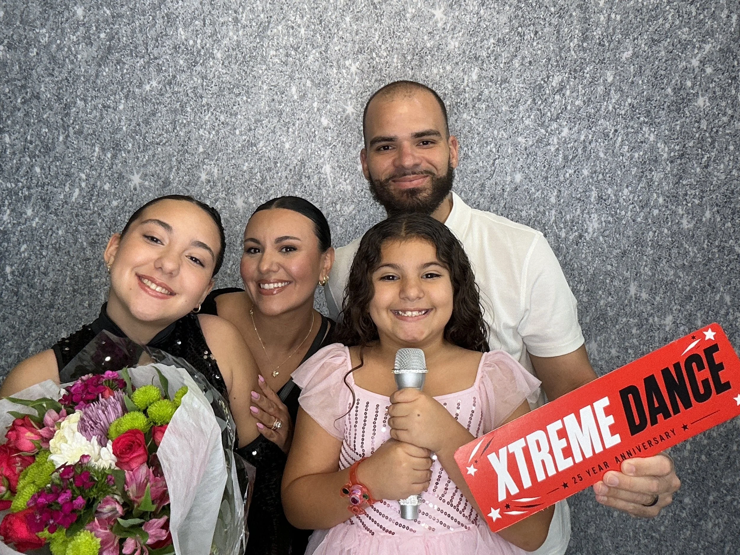 Family enjoying a Photo Booth experience at a celebration in Oviedo, Florida