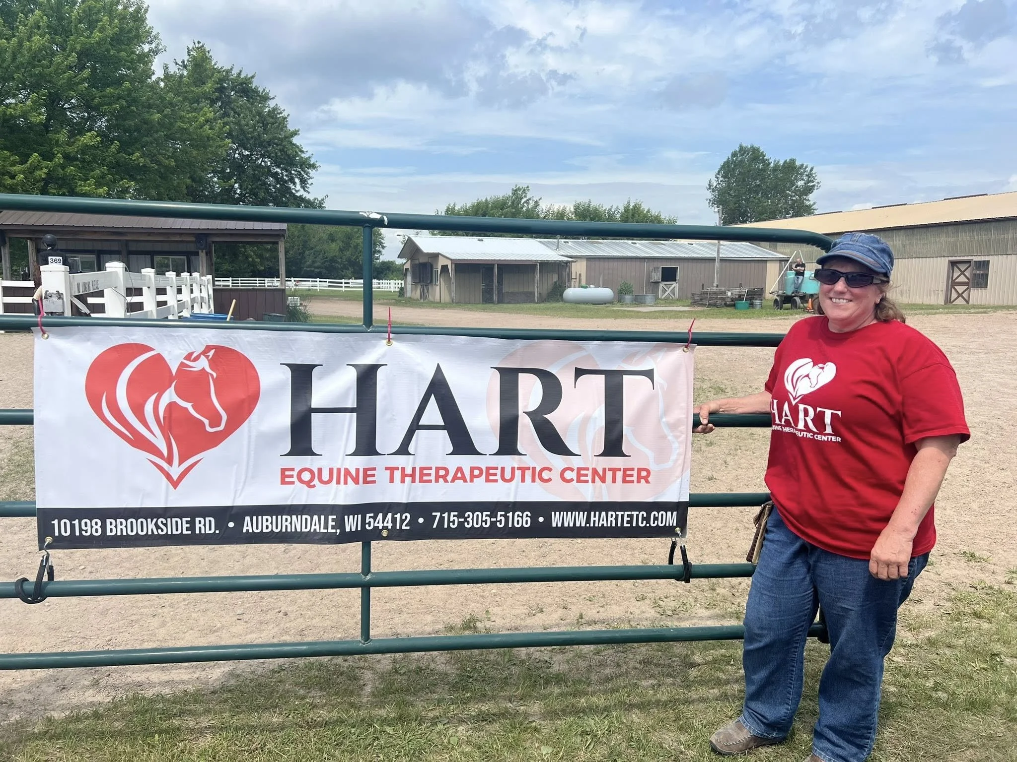 Kim with HART sign.jpg