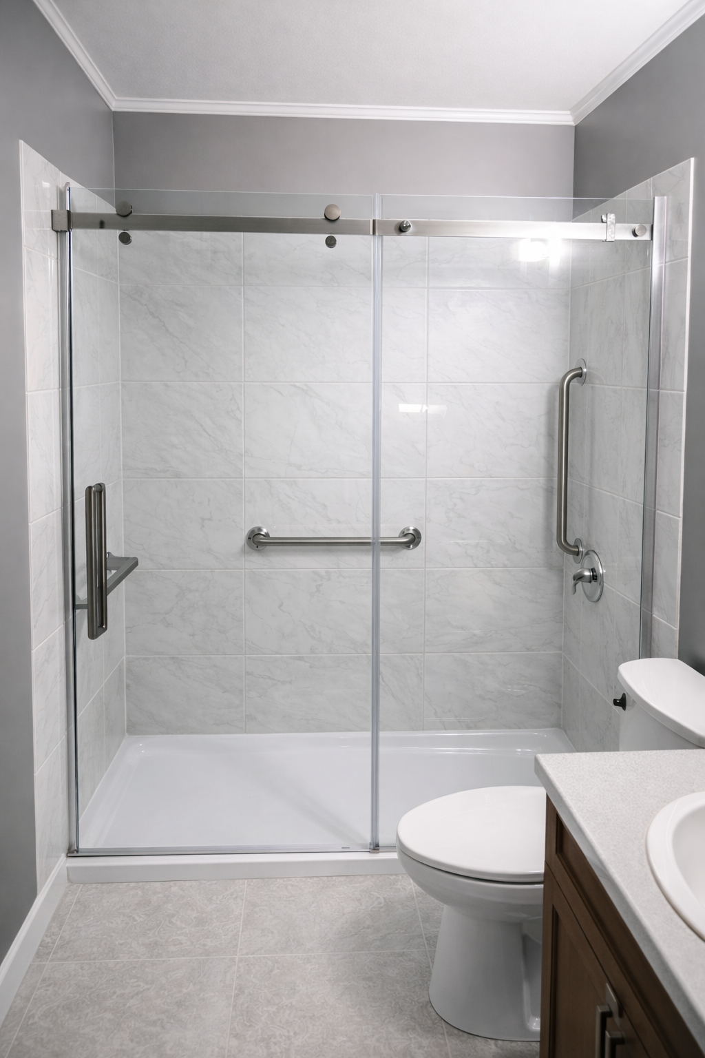 Modern bathroom with frameless shower.png