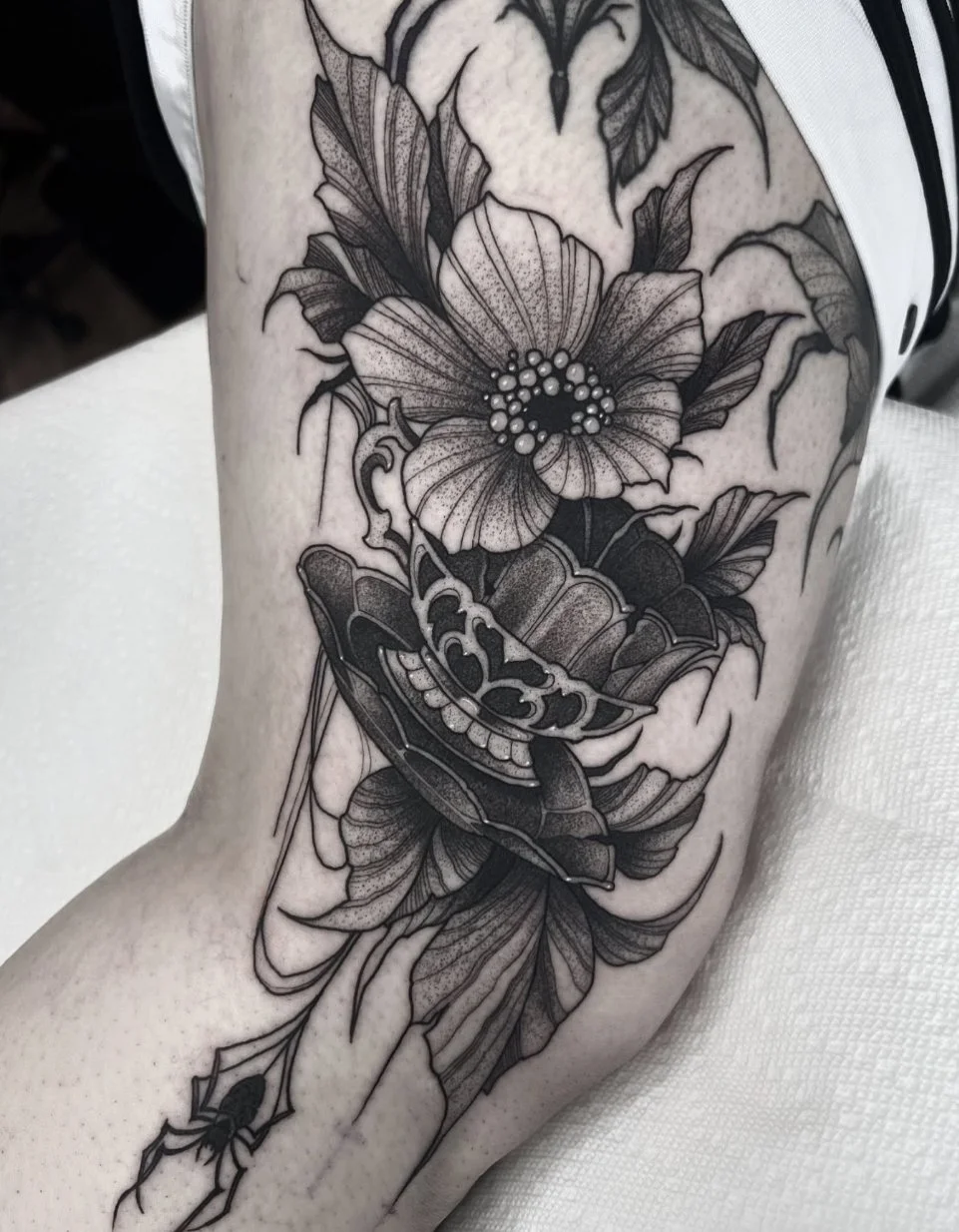 Blackwork tattoo Rochester NY Teacup floral spider