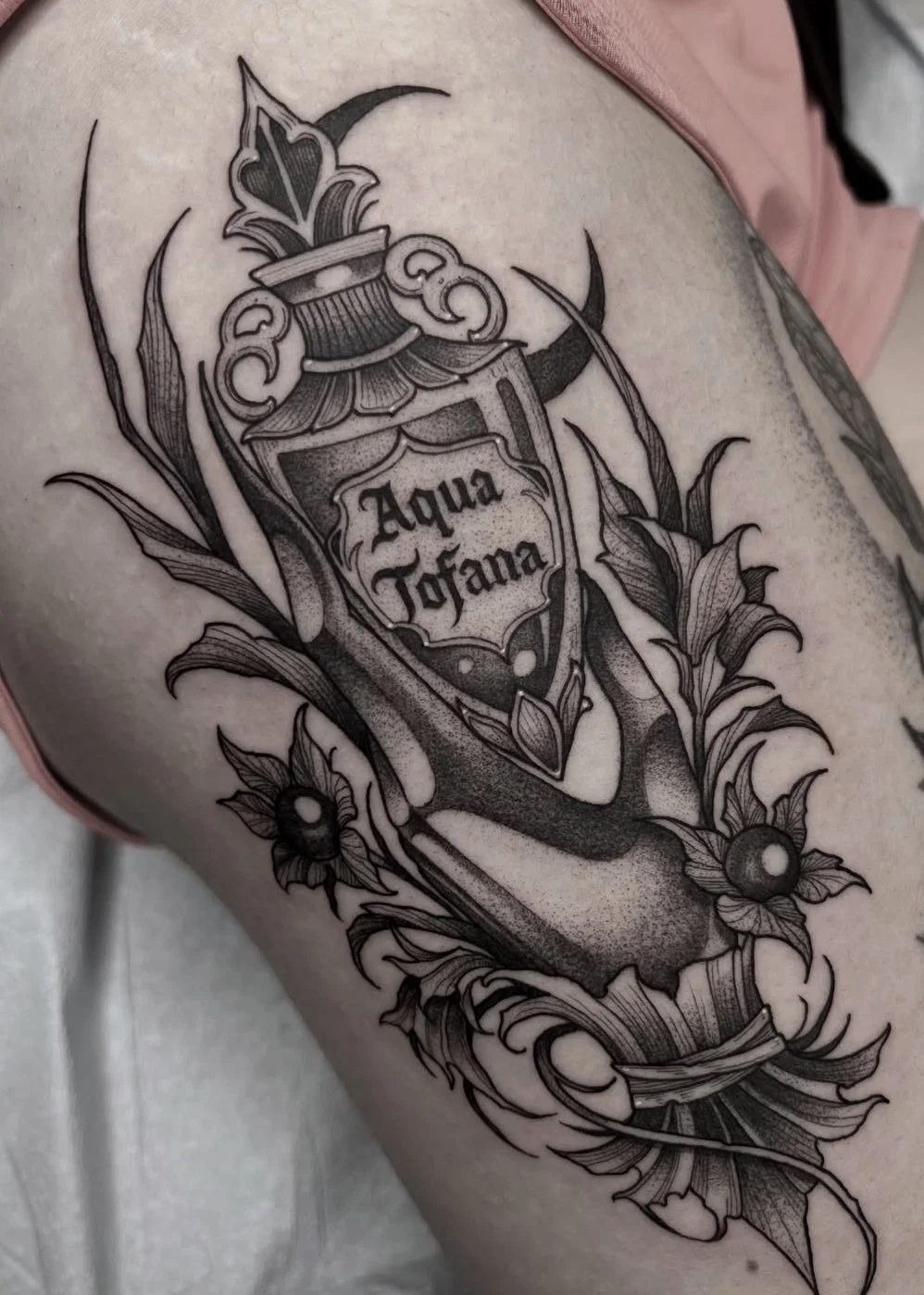 Blackwork tattoo Rochester NY Poison bottle deadly nightshade