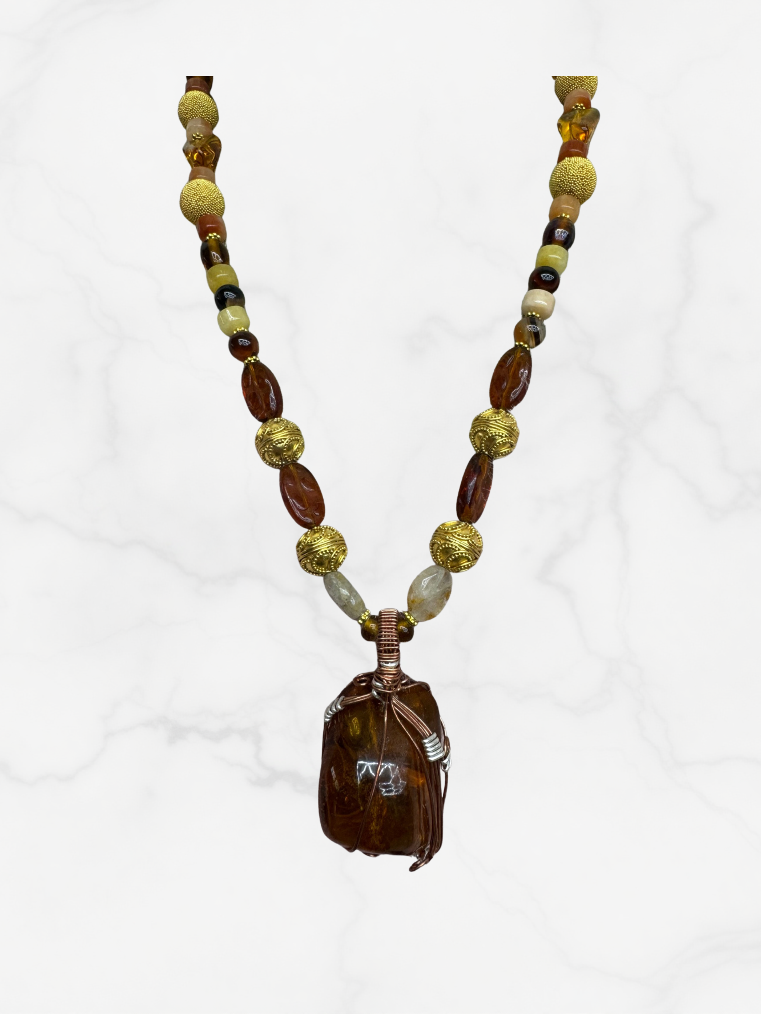 The Golden Earth Pendant