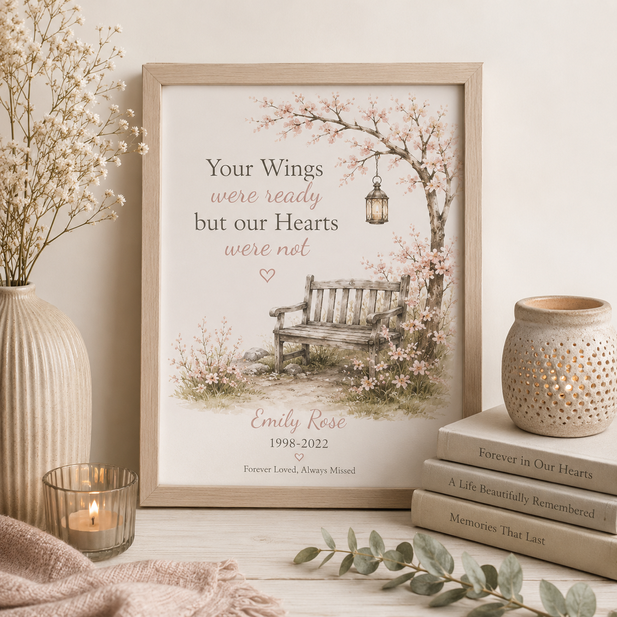 Luxury personalised memorial print by Memories Kept, displayed in a natural oak frame with a peaceful blossom tree and remembrance bench design.