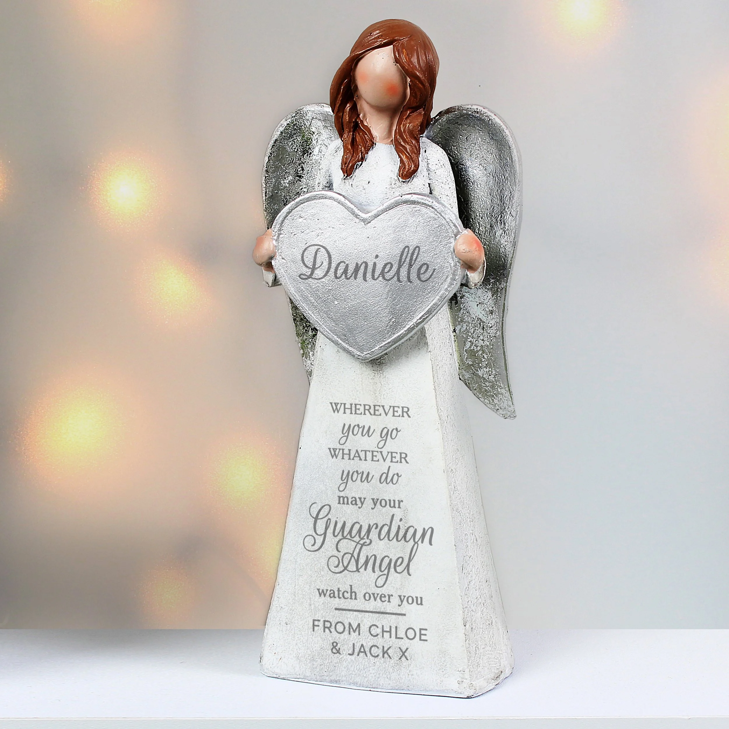 Luxury personalised guardian angel memorial keepsake featuring a silver heart, custom name and heartfelt remembrance message.