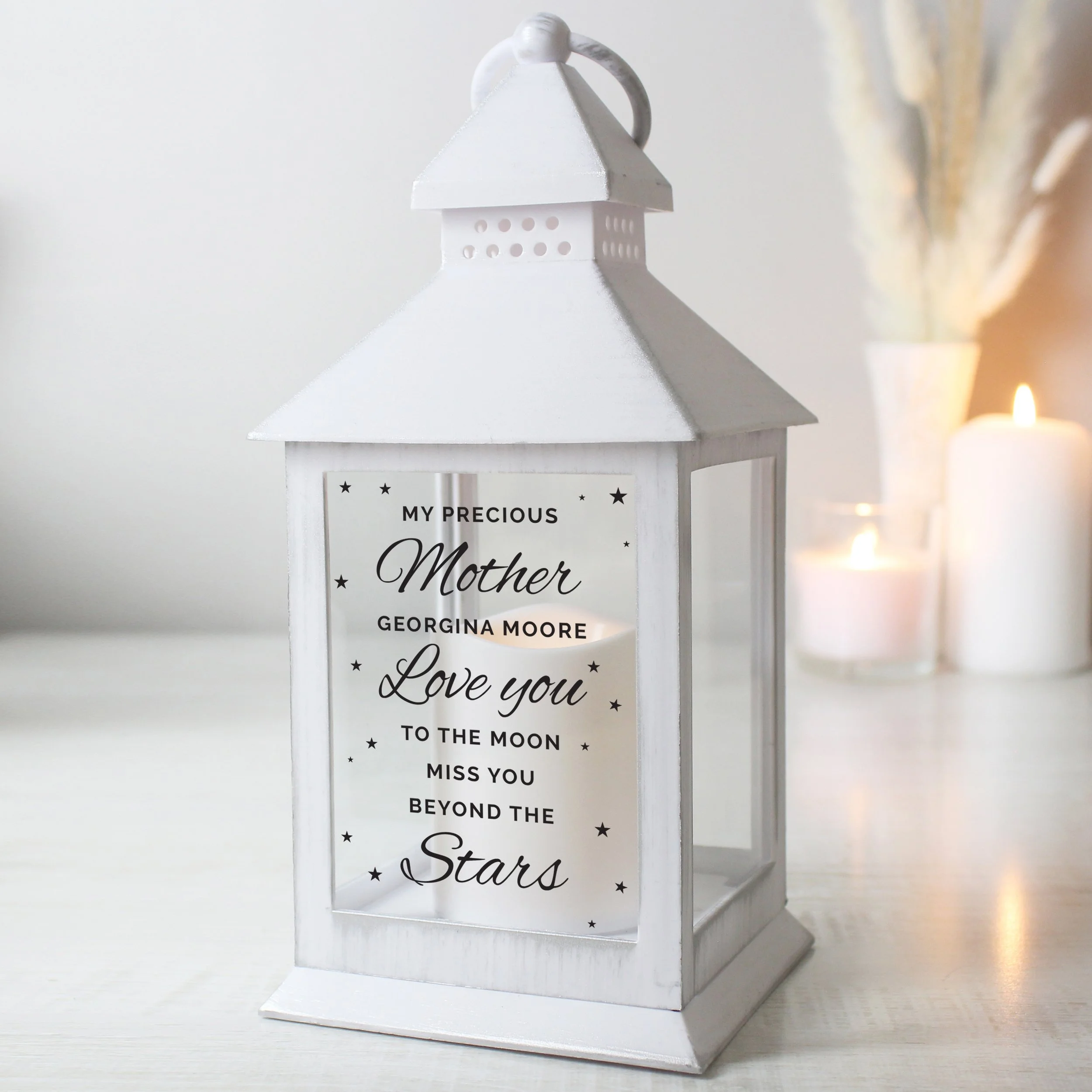 Personalised memorial gifts including engraved keepsakes, photo frames, candles, plaques and remembrance gifts for loved ones and pets.