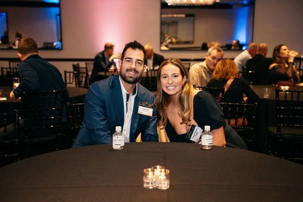 Photographer photographing attendees at a conference at the Omni Dallas.