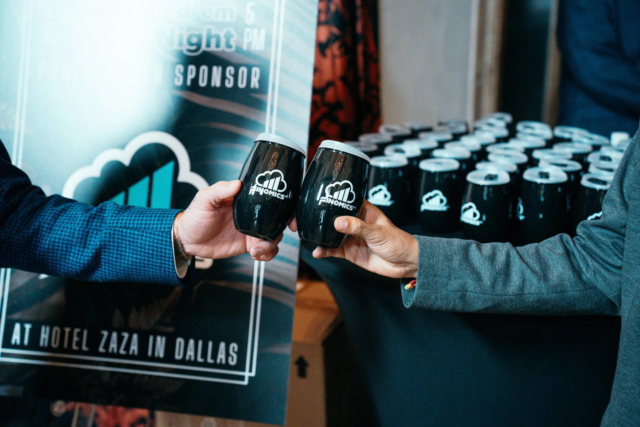 Professional photography of sponsor branding and merchandise at a conference in Dallas, TX.