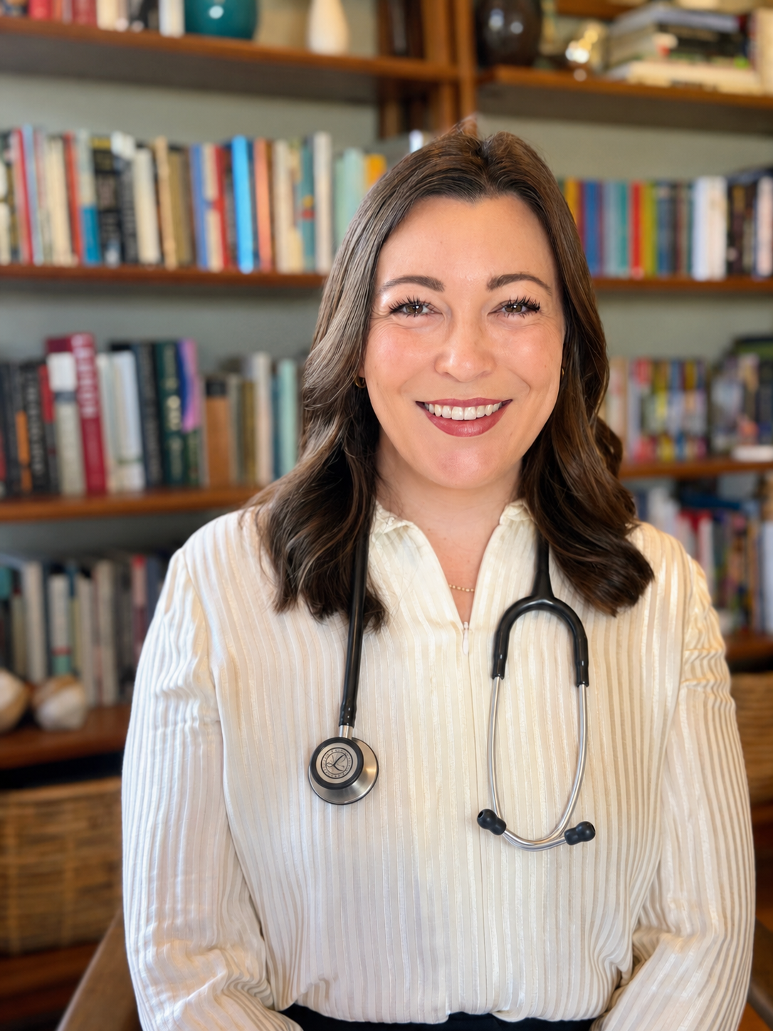 Dr. Ariana Feuvrier, MD, internal medicine physician, wearing a stethoscope