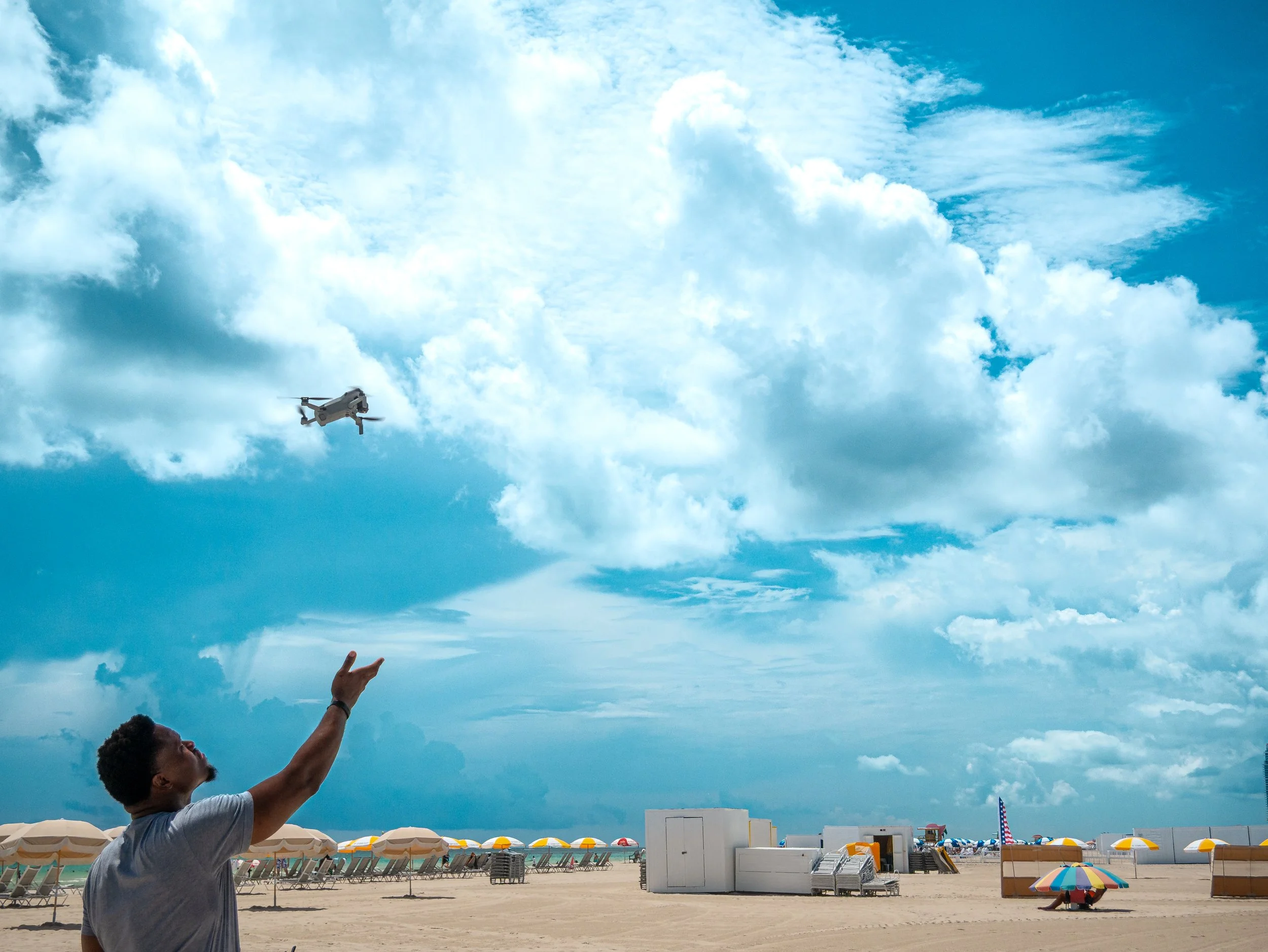 Steve launching a drone on Miami Beach, Stevenson Drone Photography