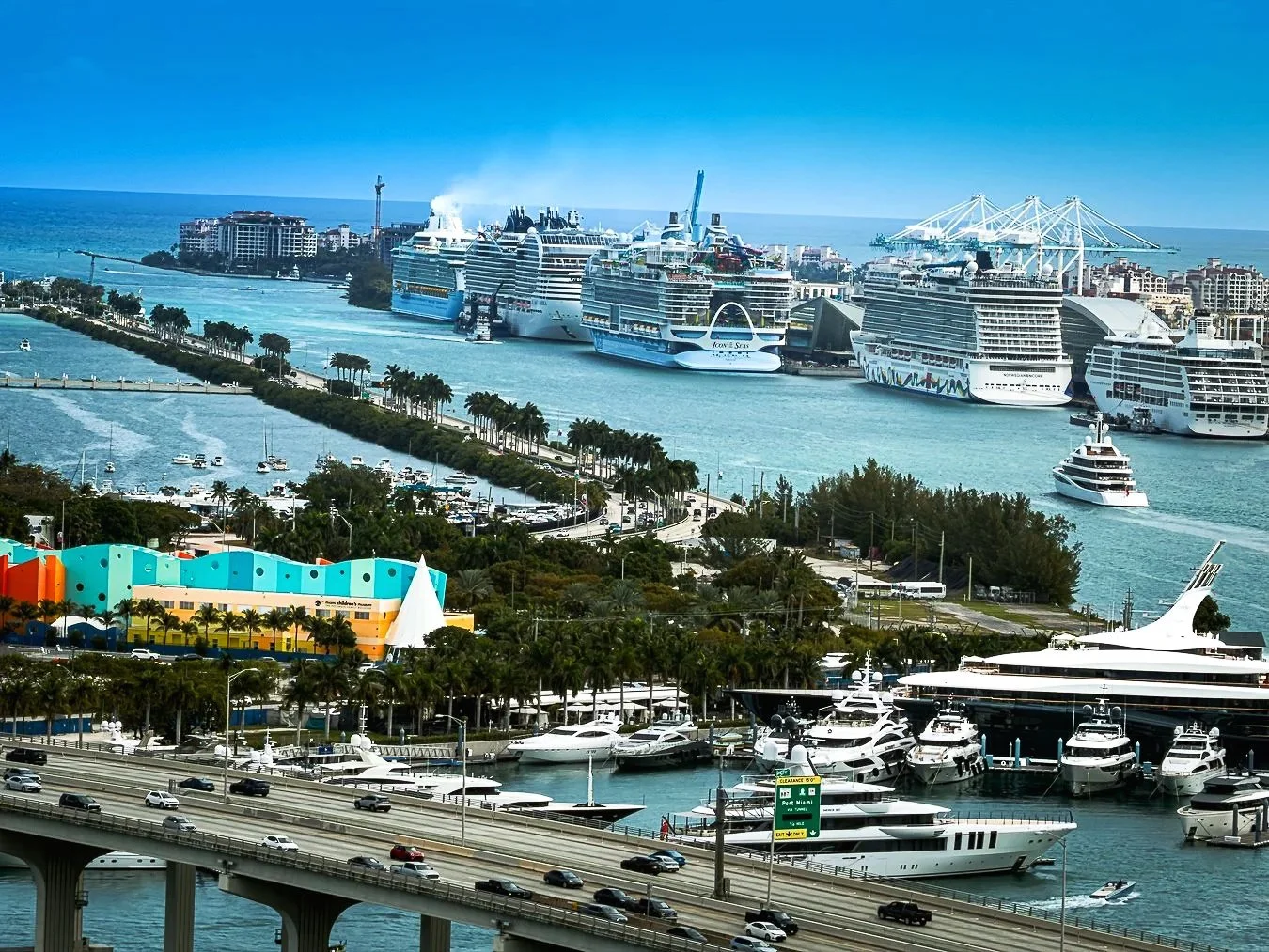 Multiple cruise ships docked at the port of Miami.