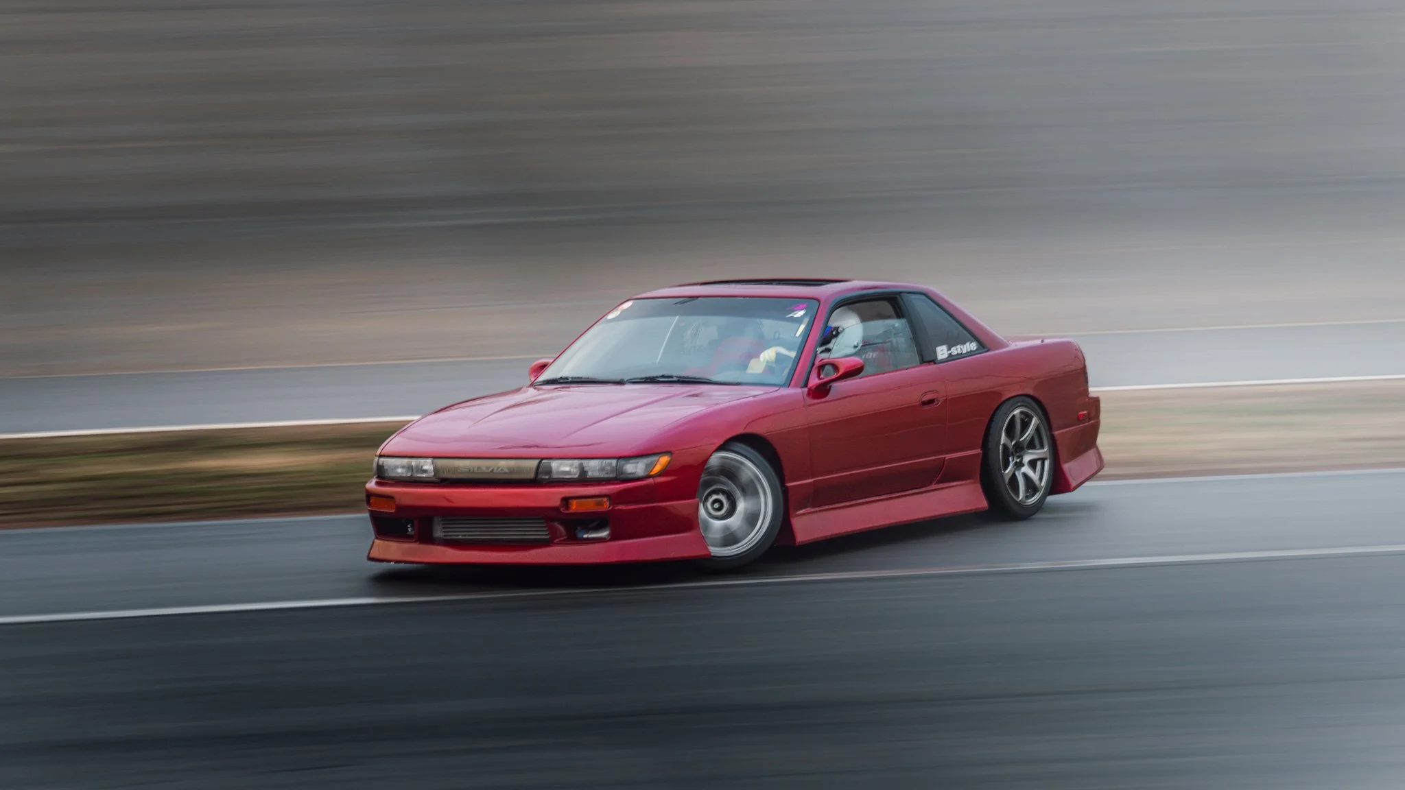 Red 240sx w/ Silvia front end conversion S13 drifting  at stoopicold at Nashville Super Speedway