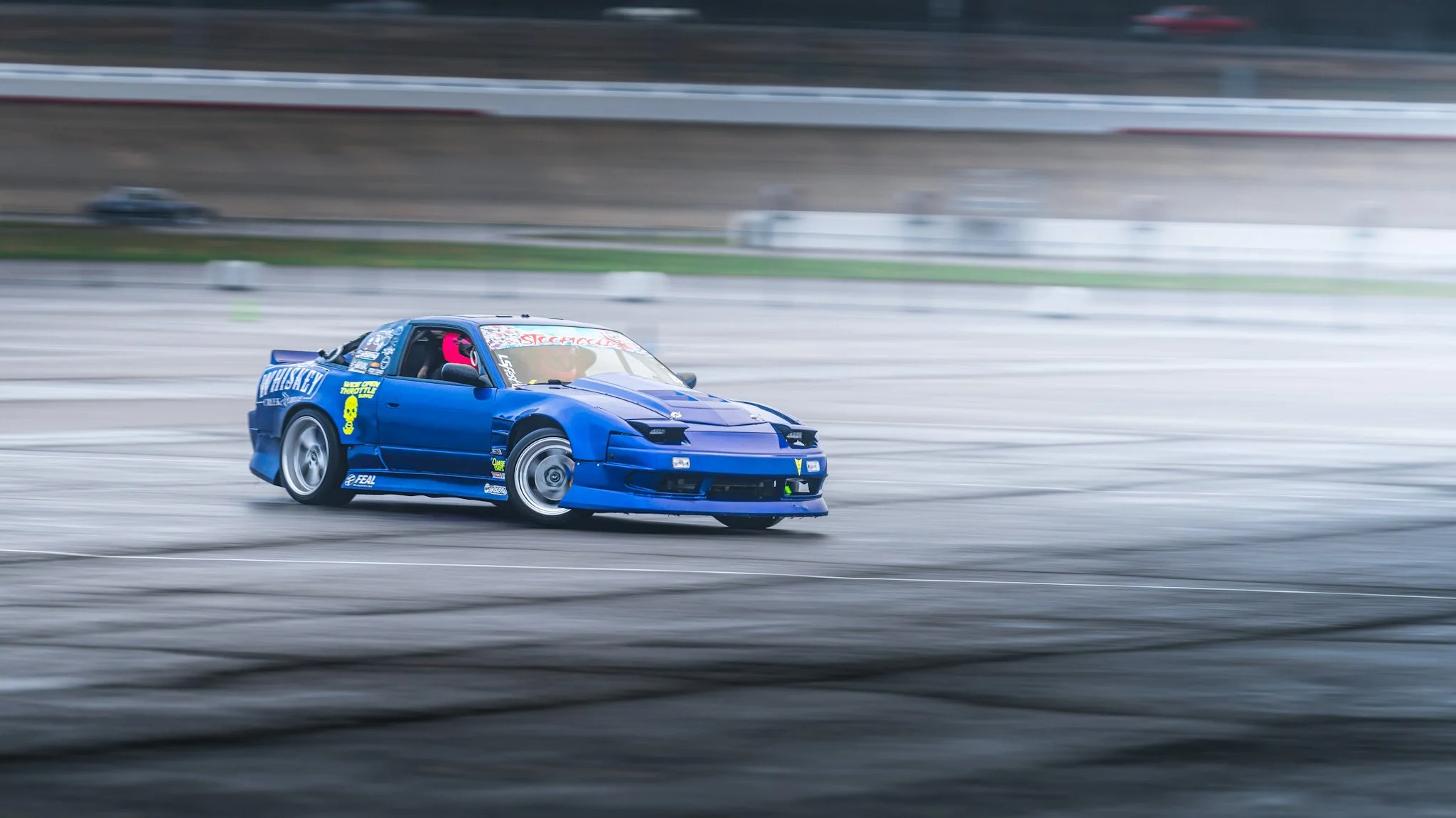 Blue 240sx S13 drifting  at stoopicold at Nashville Super Speedway