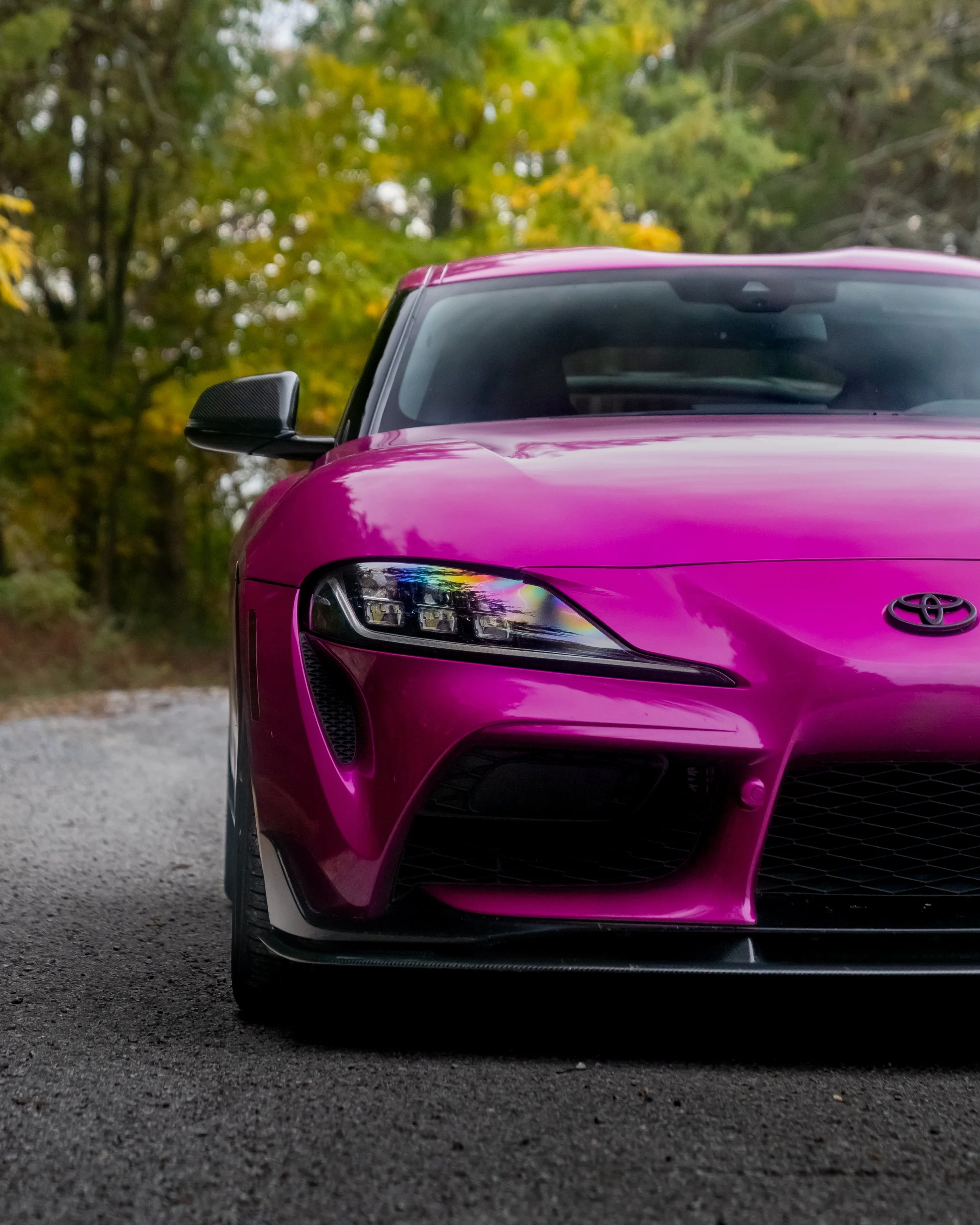 Front passenger shot of fuchsia mk5 Toyota Supra