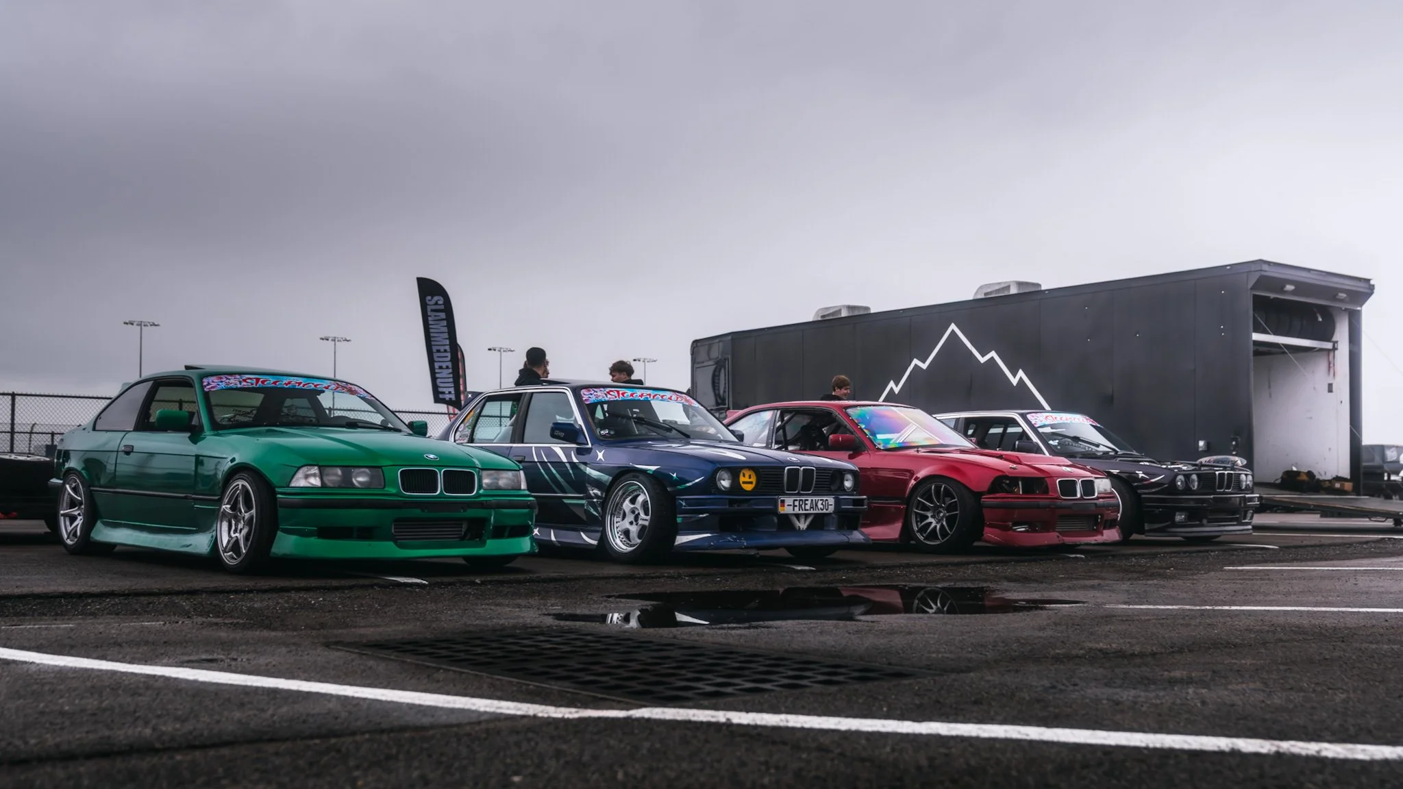 Line up of various BMW drift cars at stoopicold at Nashville Super Speedway