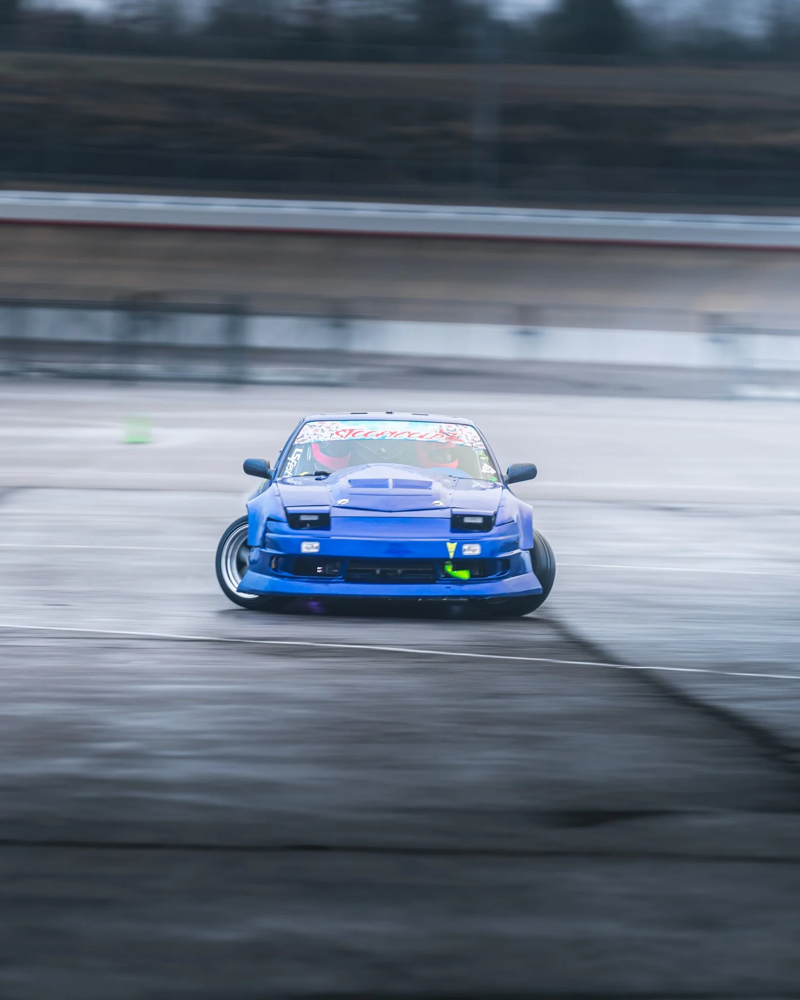 Blue 240sx S13 drifting  at stoopicold at Nashville Super Speedway