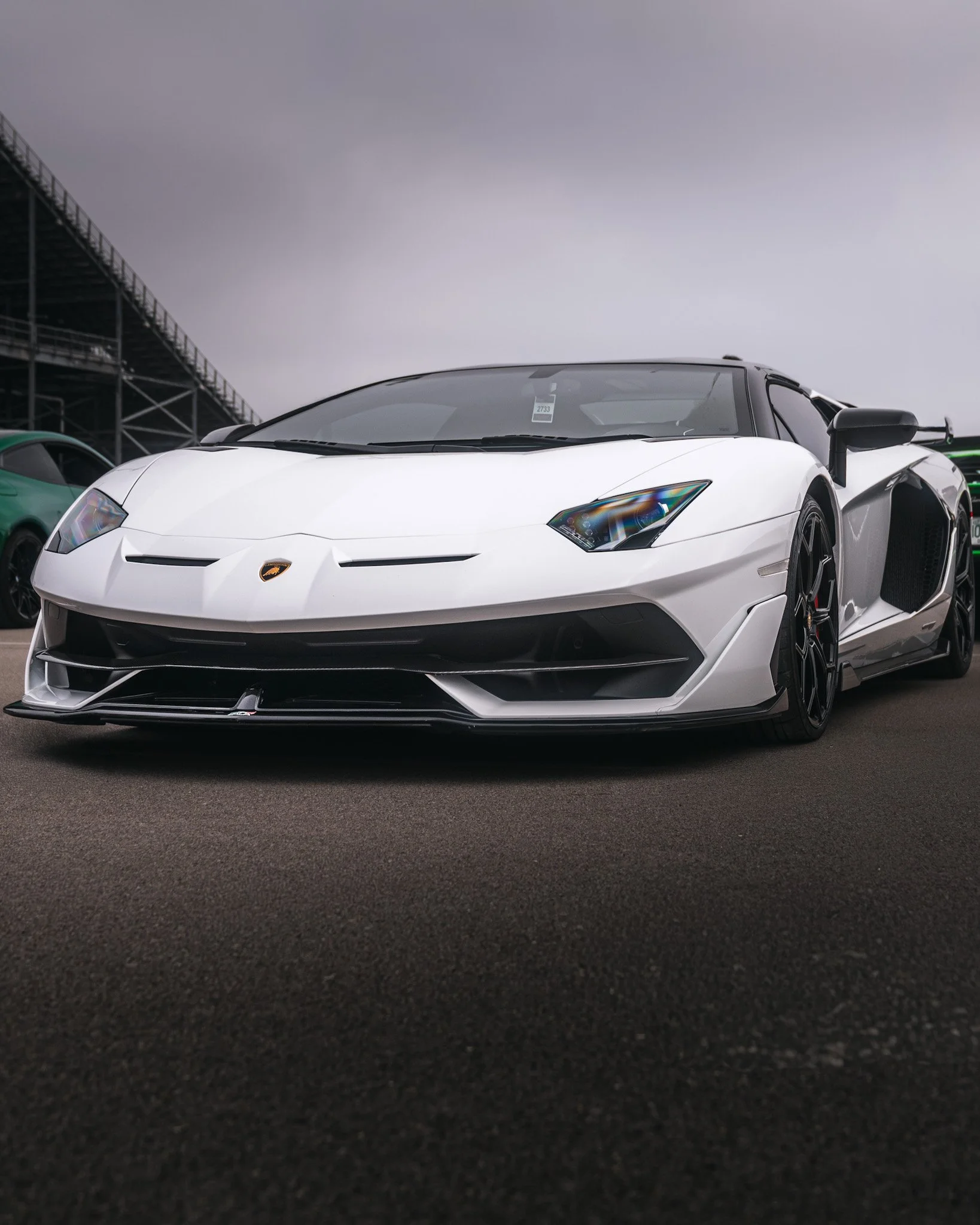 front quarter shot of white svj at nashville cars and coffee