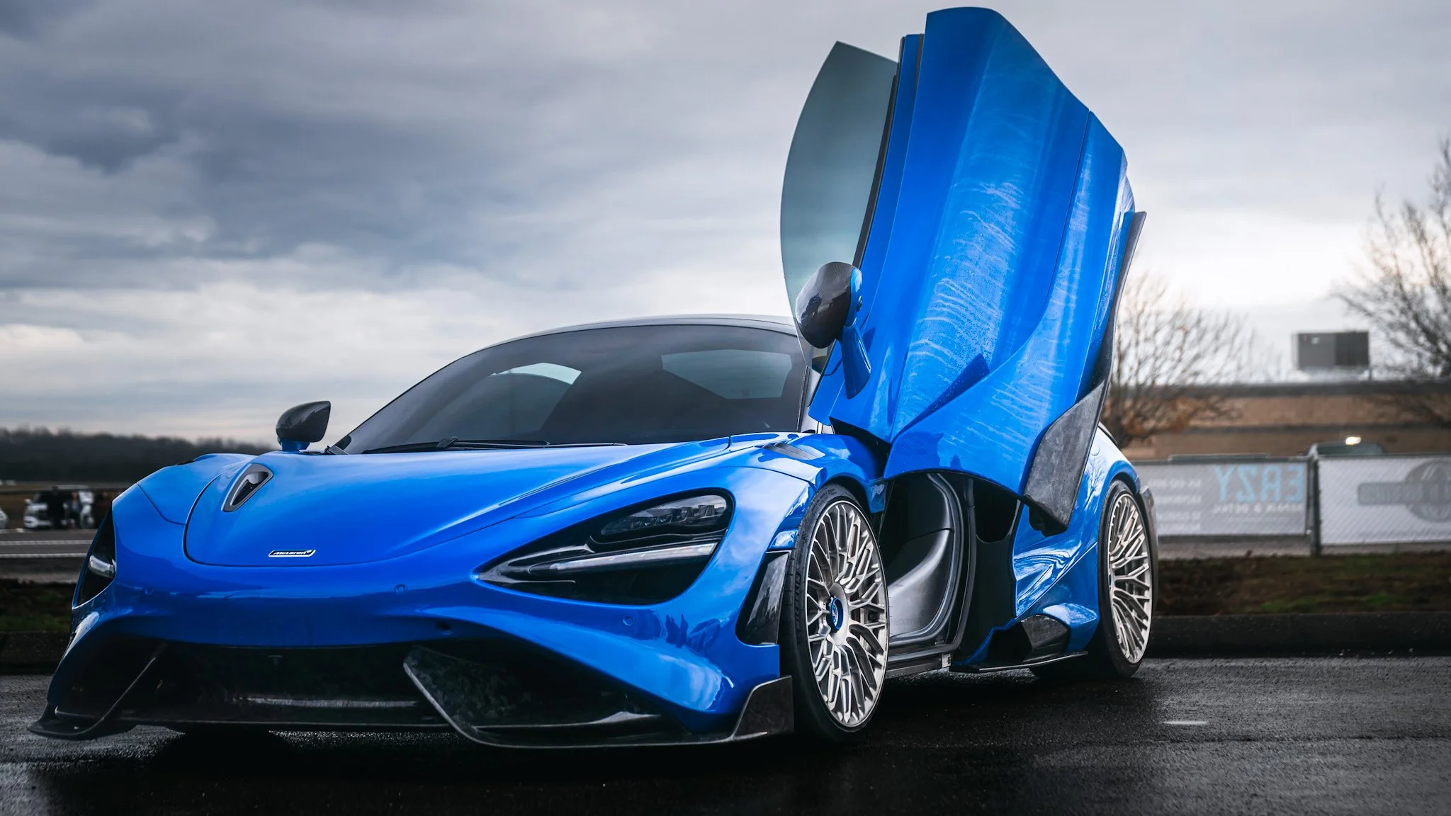 Blue McLaren at Nashville Cars and coffee with door open