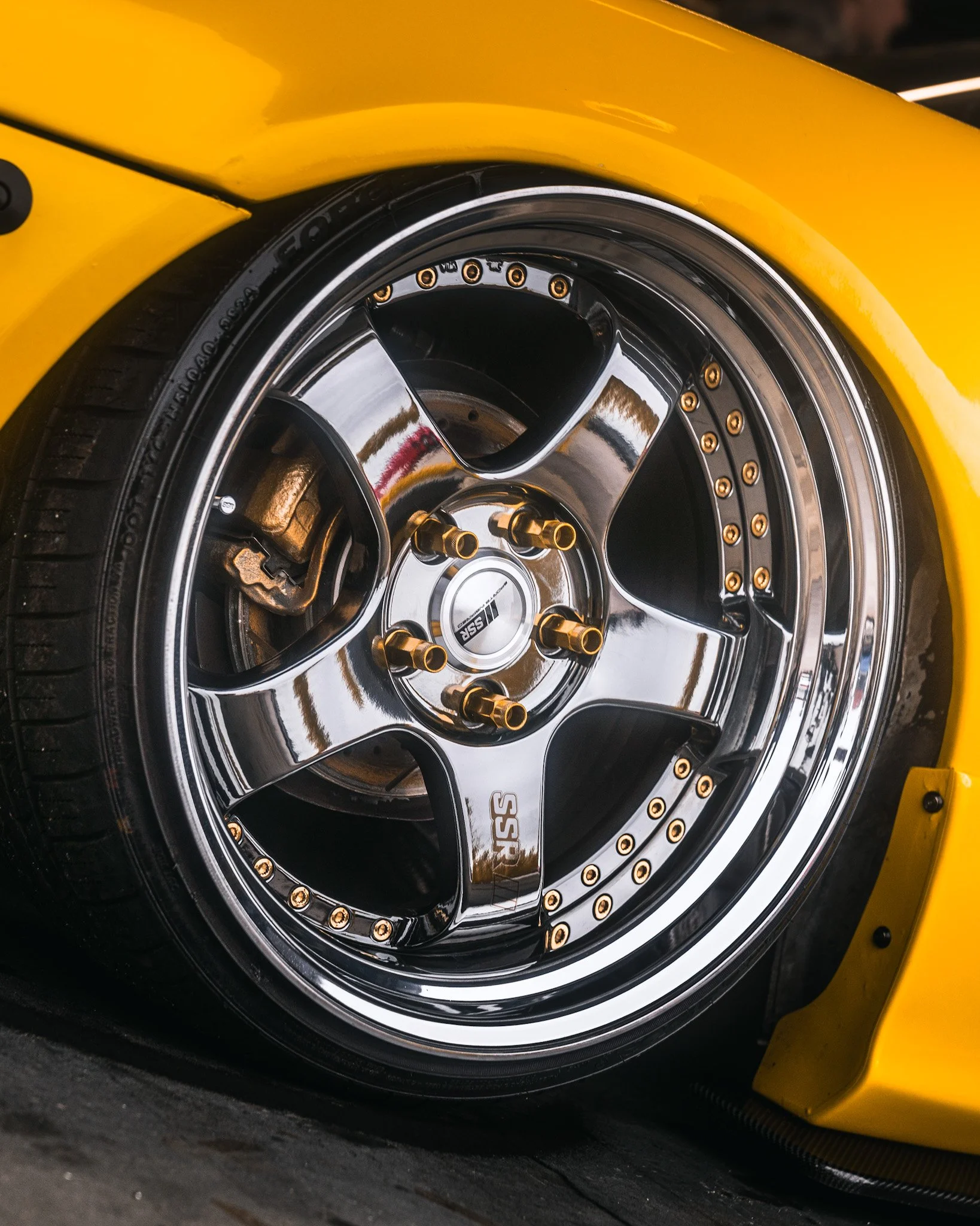 SSR wheel shot of yellow Nissan S14.5 at stoopicold