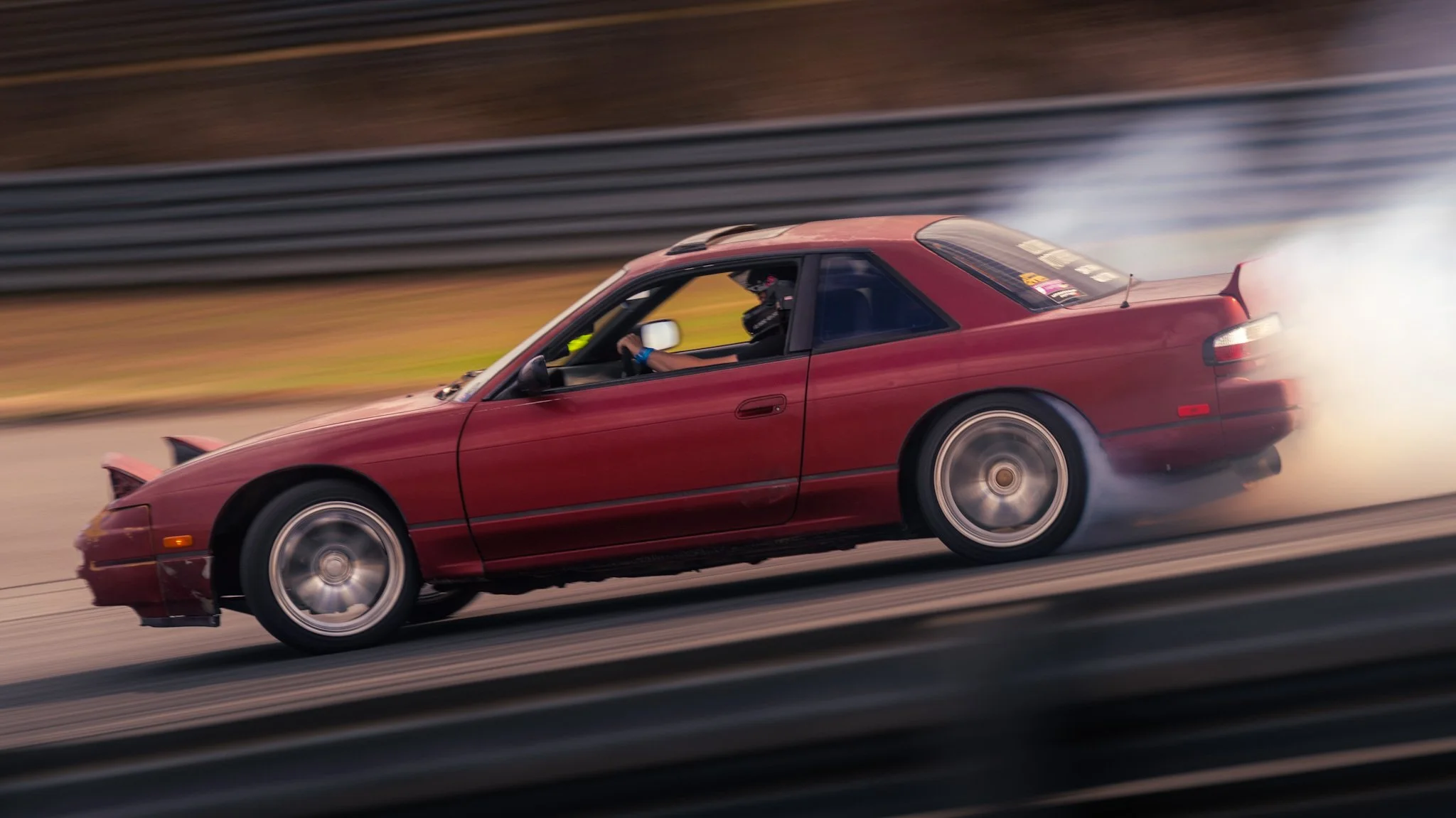 red 240 sx s13 drifting at NCM motorsports park in bowling green KY